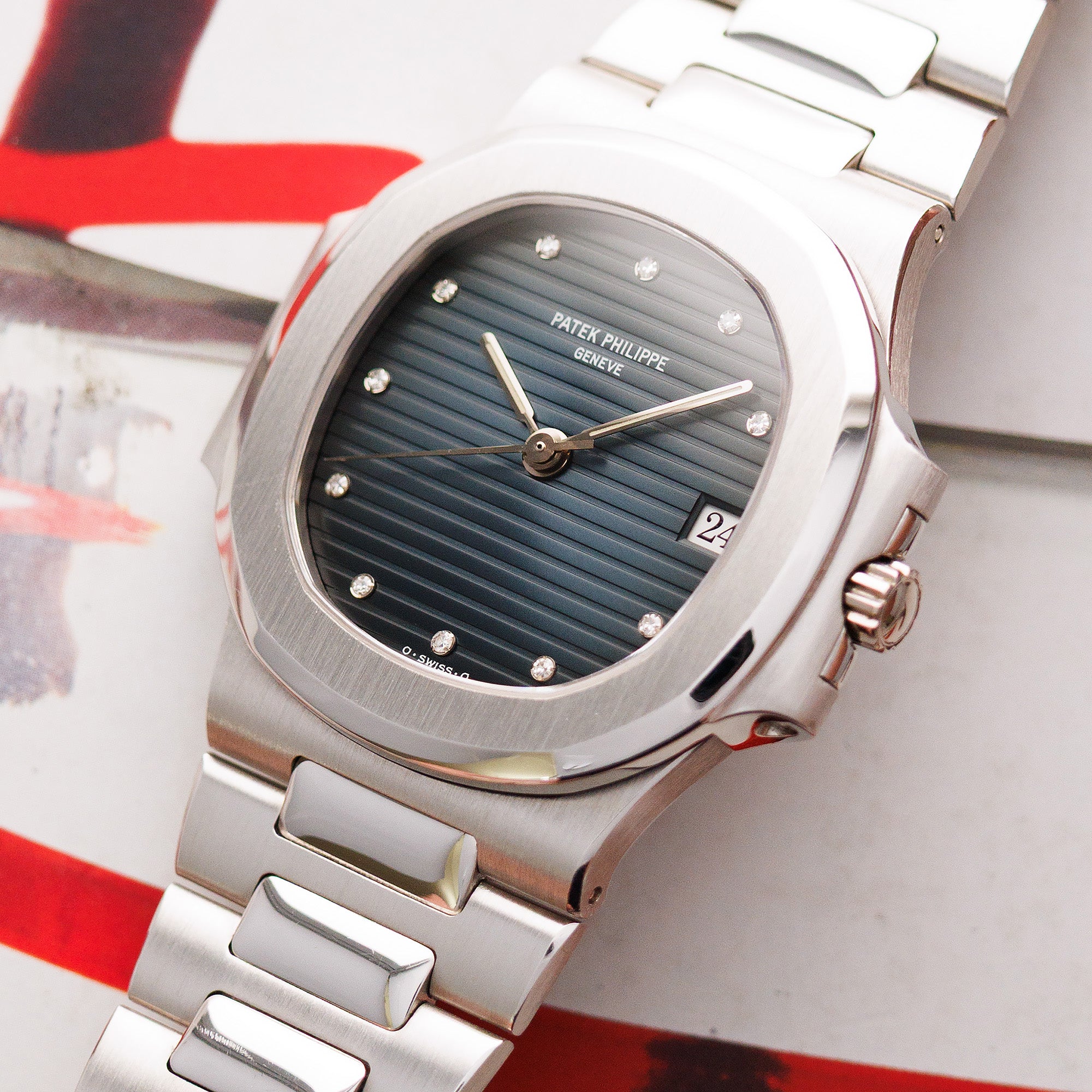 Patek Philippe - Patek Philippe Platinum Nautilus Watch Ref. 3800 with Original Box and Papers - The Keystone Watches
