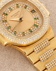 Patek Philippe Yellow Gold Nautilus Ref. 3800/105 with Pave Diamond and Emerald