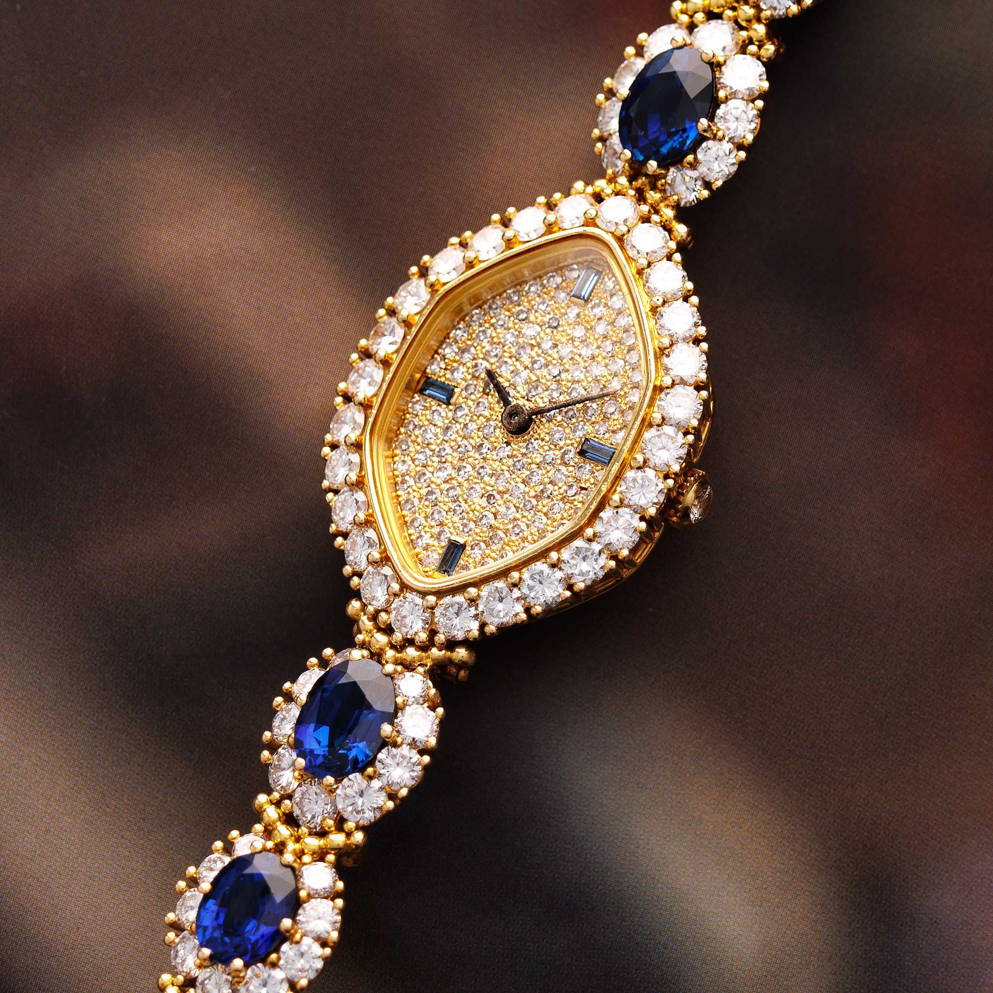 Patek Philippe - Patek Philippe Yellow Gold Diamond & Sapphire Watch Ref. 4665 - The Keystone Watches