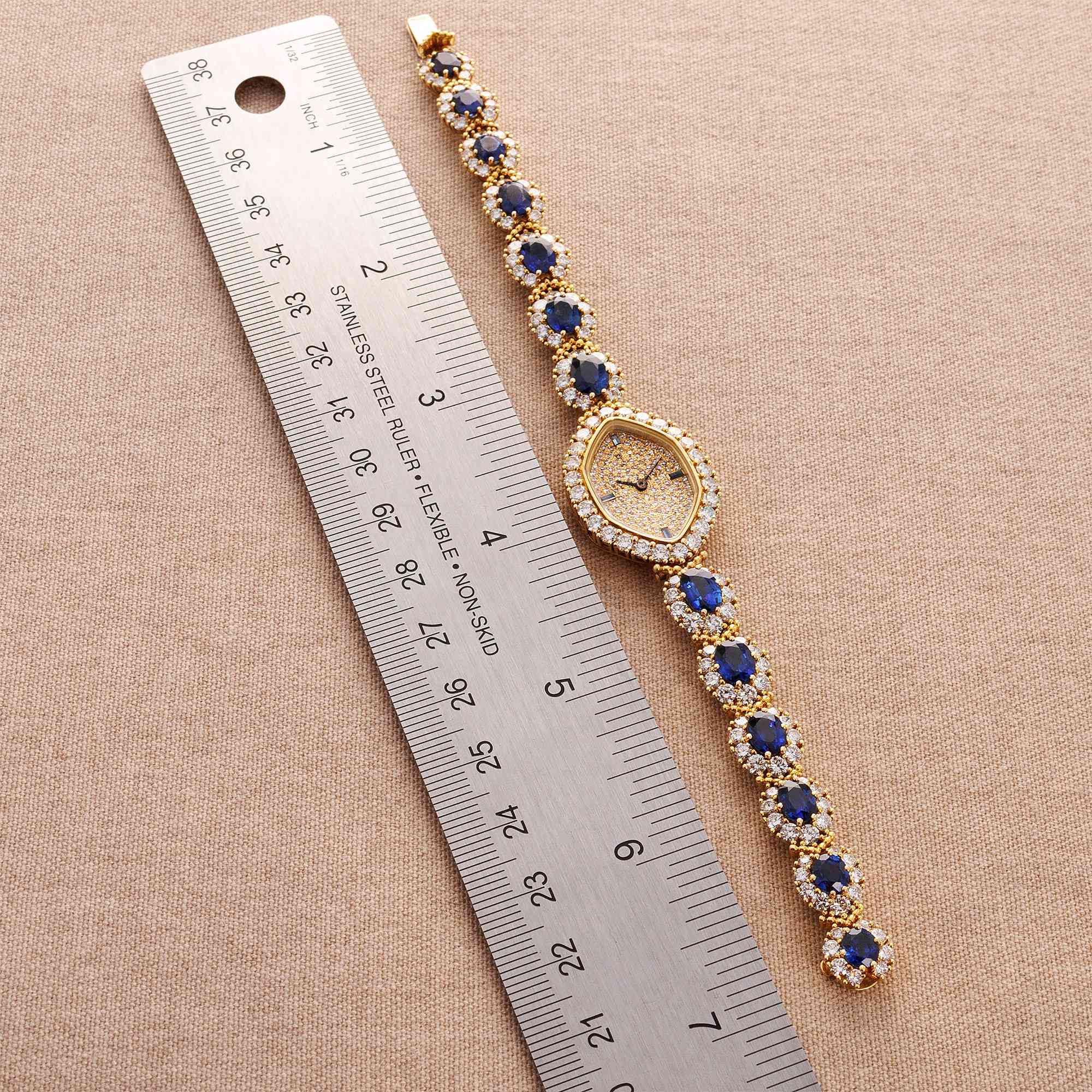 Patek Philippe - Patek Philippe Yellow Gold Diamond & Sapphire Watch Ref. 4665 - The Keystone Watches