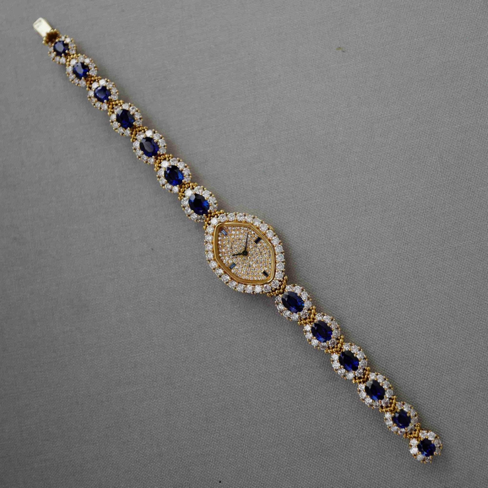 Patek Philippe - Patek Philippe Yellow Gold Diamond & Sapphire Watch Ref. 4665 - The Keystone Watches