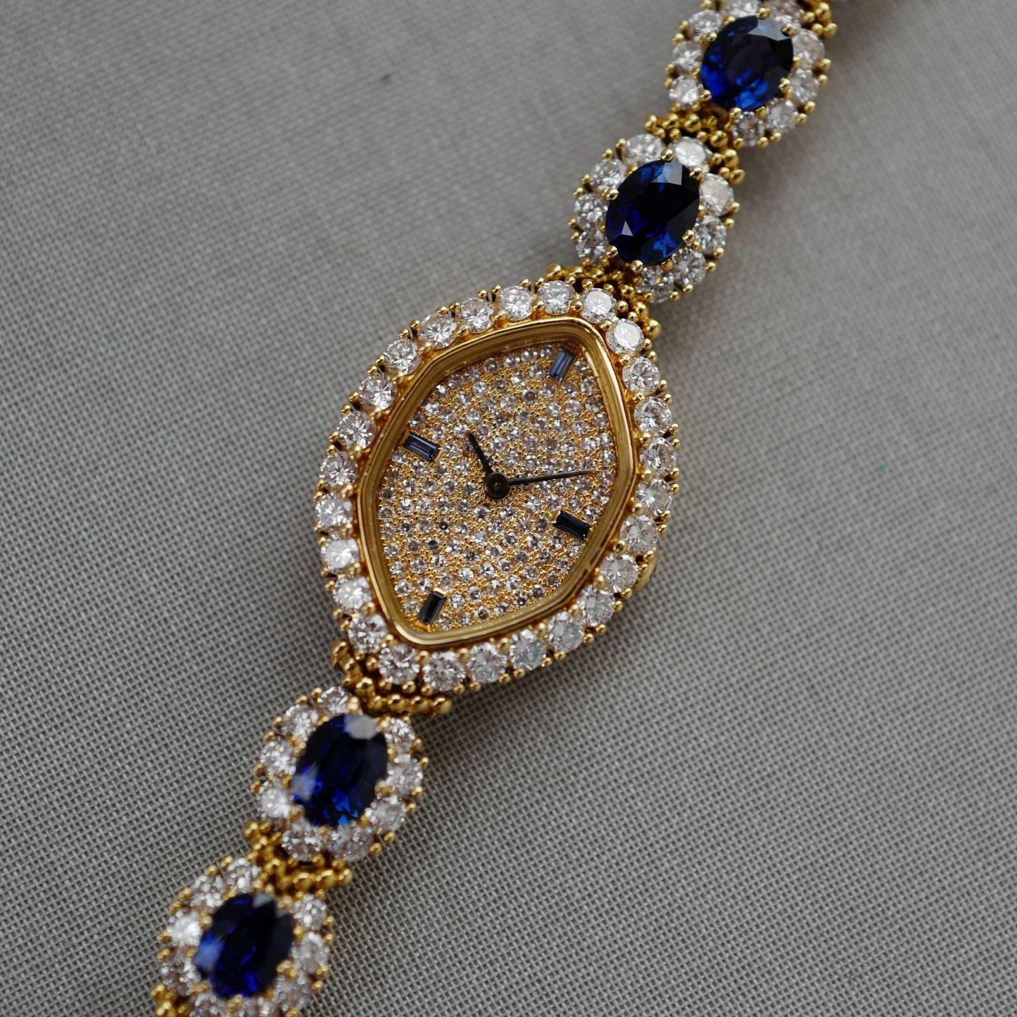Patek Philippe - Patek Philippe Yellow Gold Diamond & Sapphire Watch Ref. 4665 - The Keystone Watches