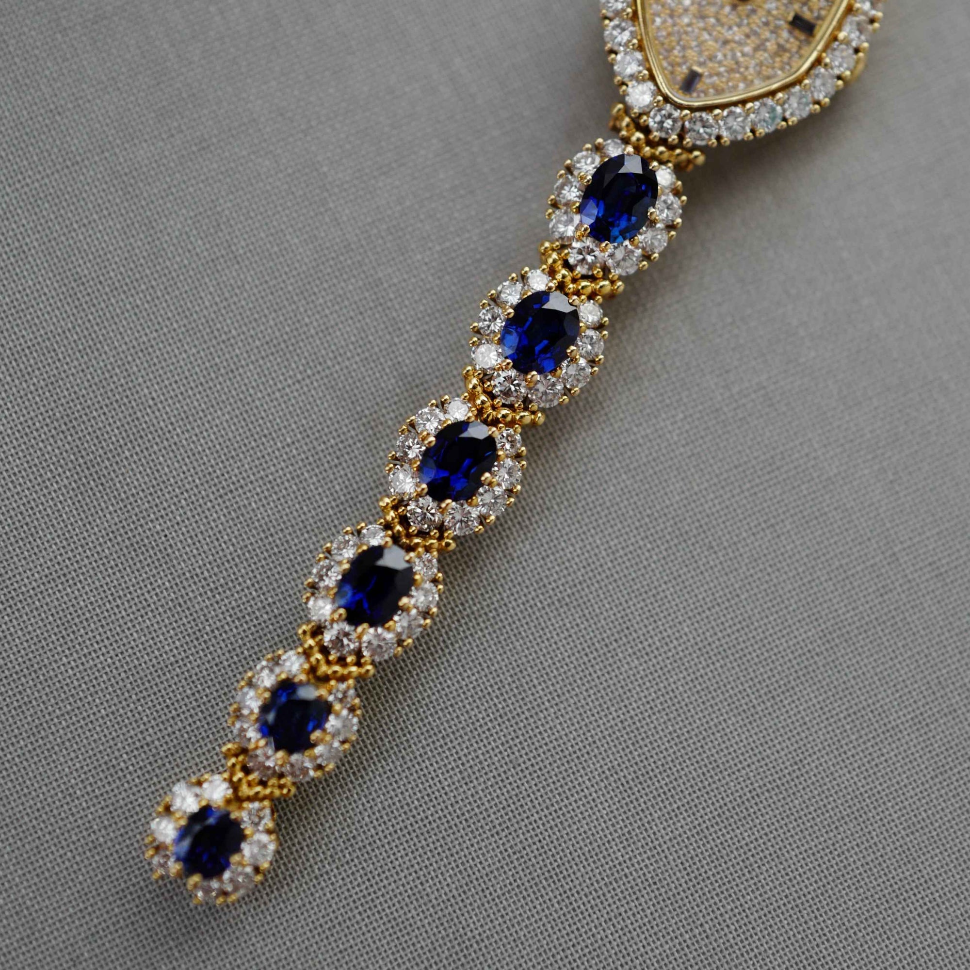 Patek Philippe - Patek Philippe Yellow Gold Diamond & Sapphire Watch Ref. 4665 - The Keystone Watches