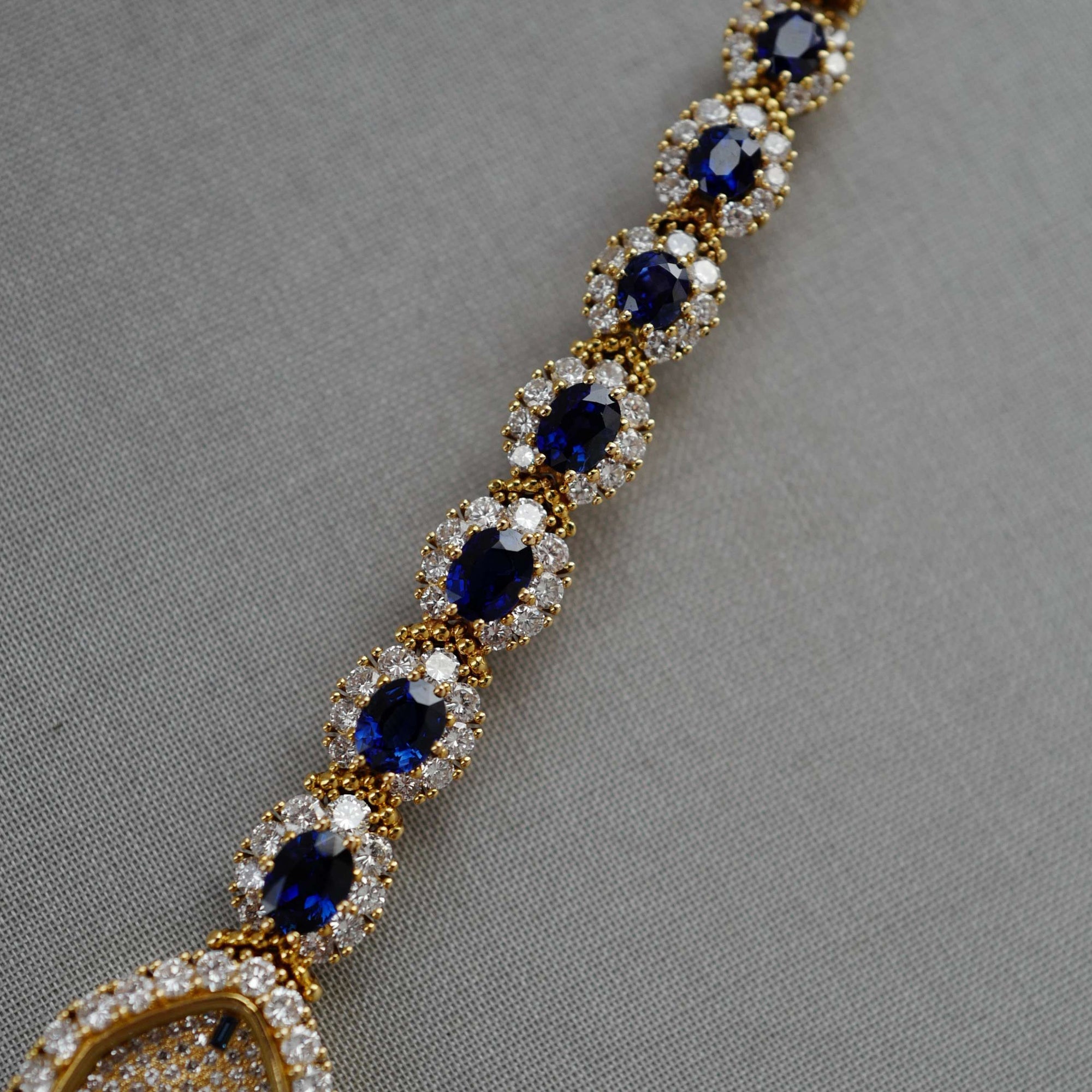 Patek Philippe - Patek Philippe Yellow Gold Diamond & Sapphire Watch Ref. 4665 - The Keystone Watches