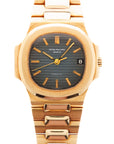 Patek Philippe Yellow Gold Nautilus Watch Ref. 3800 retailed by Gubelin in Top Condition