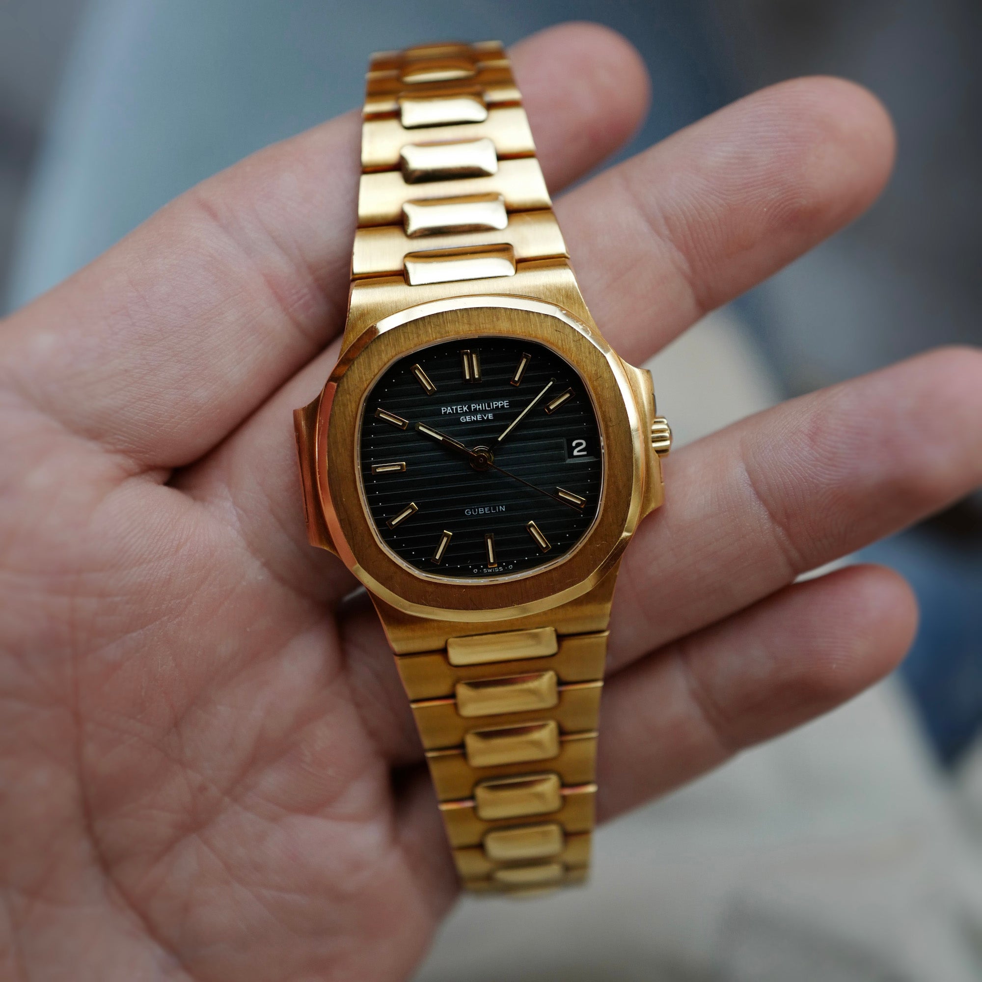 Patek Philippe Yellow Gold Nautilus Watch Ref. 3800 retailed by Gubelin in Top Condition