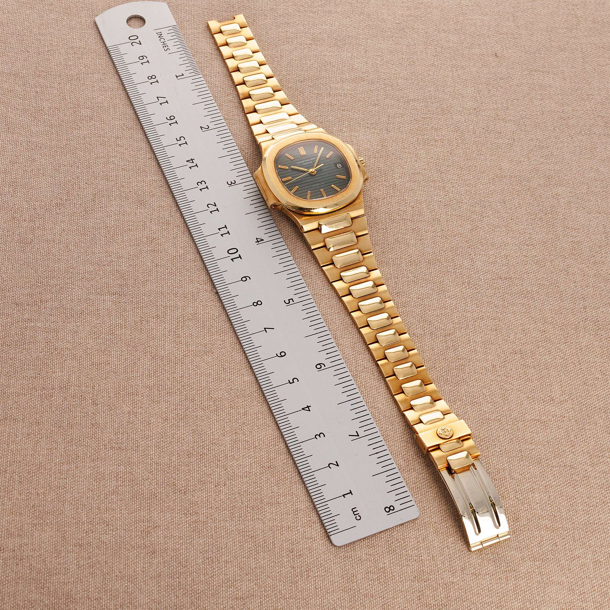 Patek Philippe Yellow Gold Nautilus Watch Ref. 3800 retailed by Gubelin in Top Condition