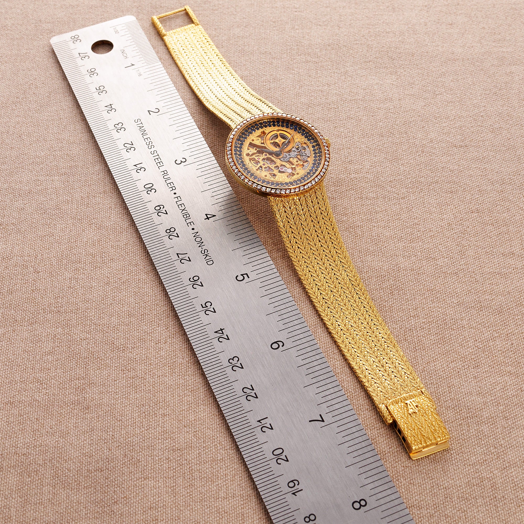 Audemars Piguet Yellow Gold Skeleton Watch with Diamonds and Sapphires