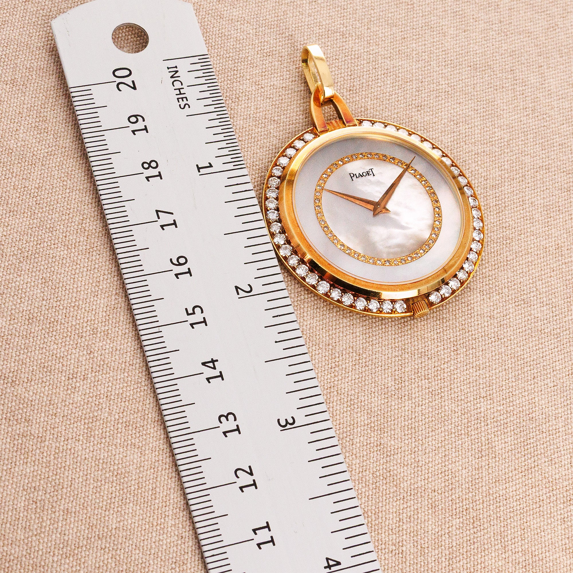 Piaget Yellow Gold and Diamond Pocket Watch with Mother of Pearl and Diamond Dial