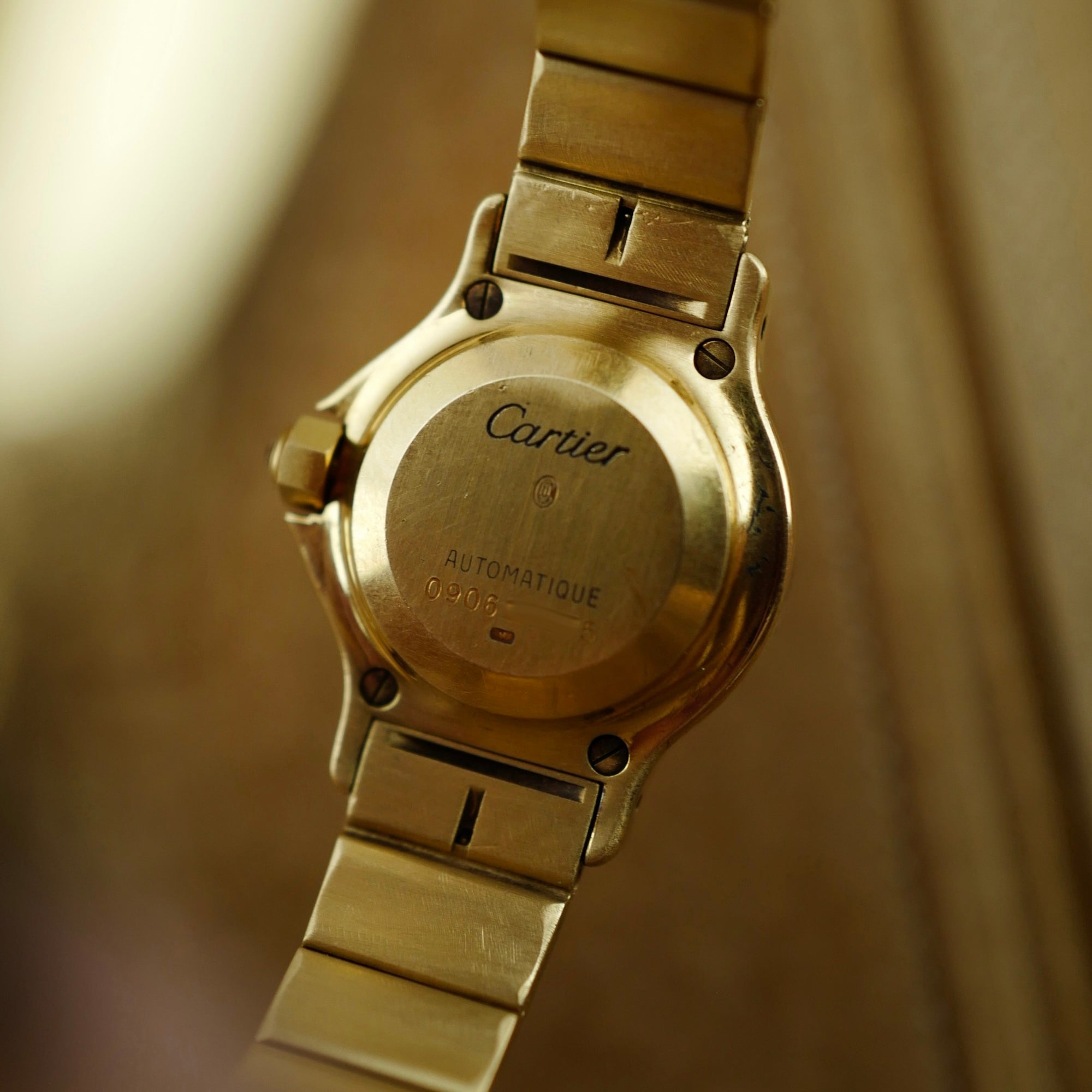 Cartier Yellow Gold Round Santos Ref. 0906 with Red Dial and Diamond Markers