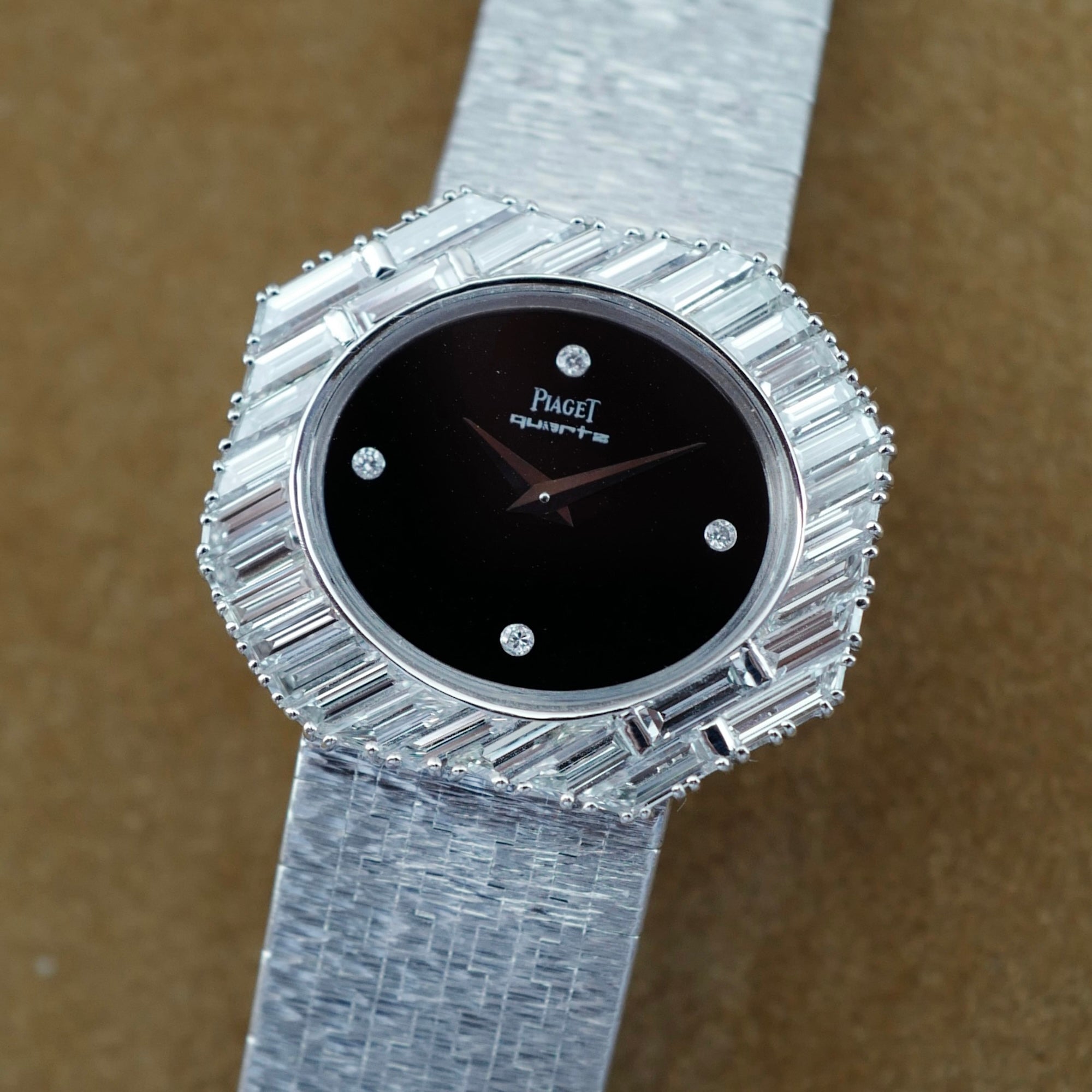 Piaget - Piaget White Gold Large Diagonal Baguette Bezel Watch with Onyx Dial 7334A6 - The Keystone Watches