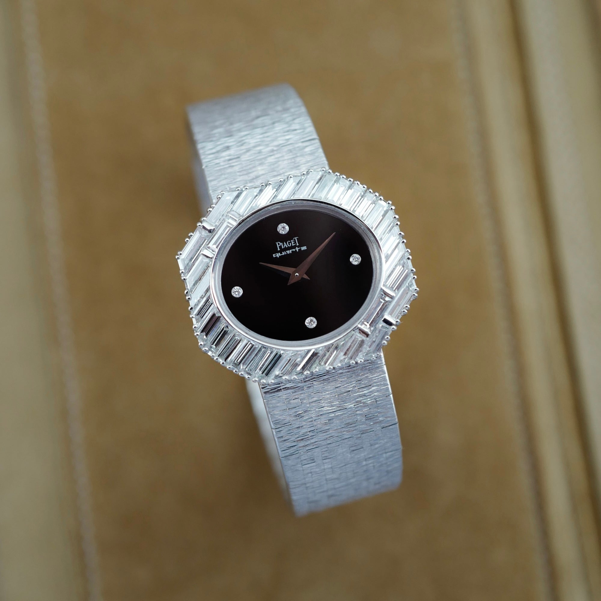 Piaget - Piaget White Gold Large Diagonal Baguette Bezel Watch with Onyx Dial 7334A6 - The Keystone Watches