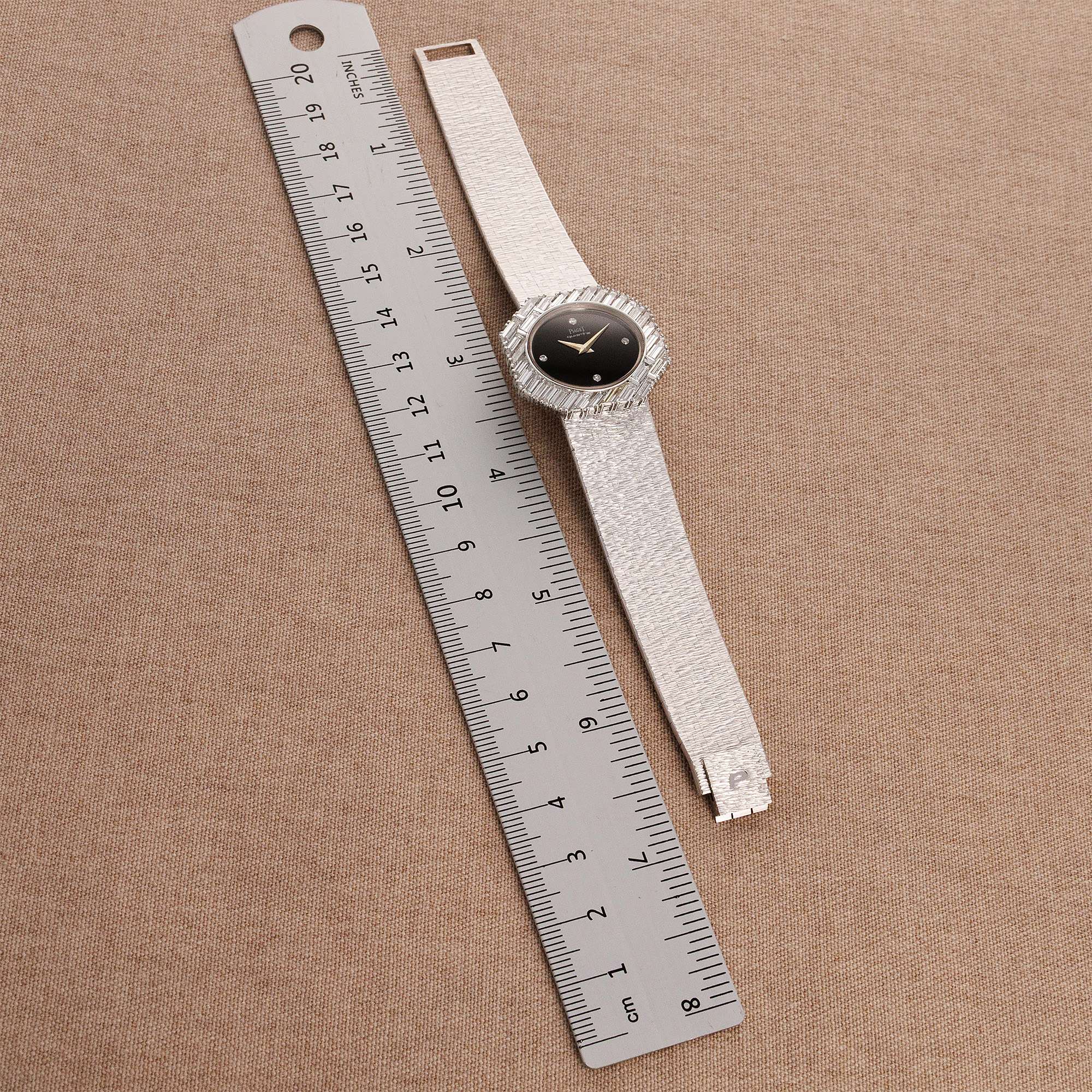 Piaget - Piaget White Gold Large Diagonal Baguette Bezel Watch with Onyx Dial 7334A6 - The Keystone Watches