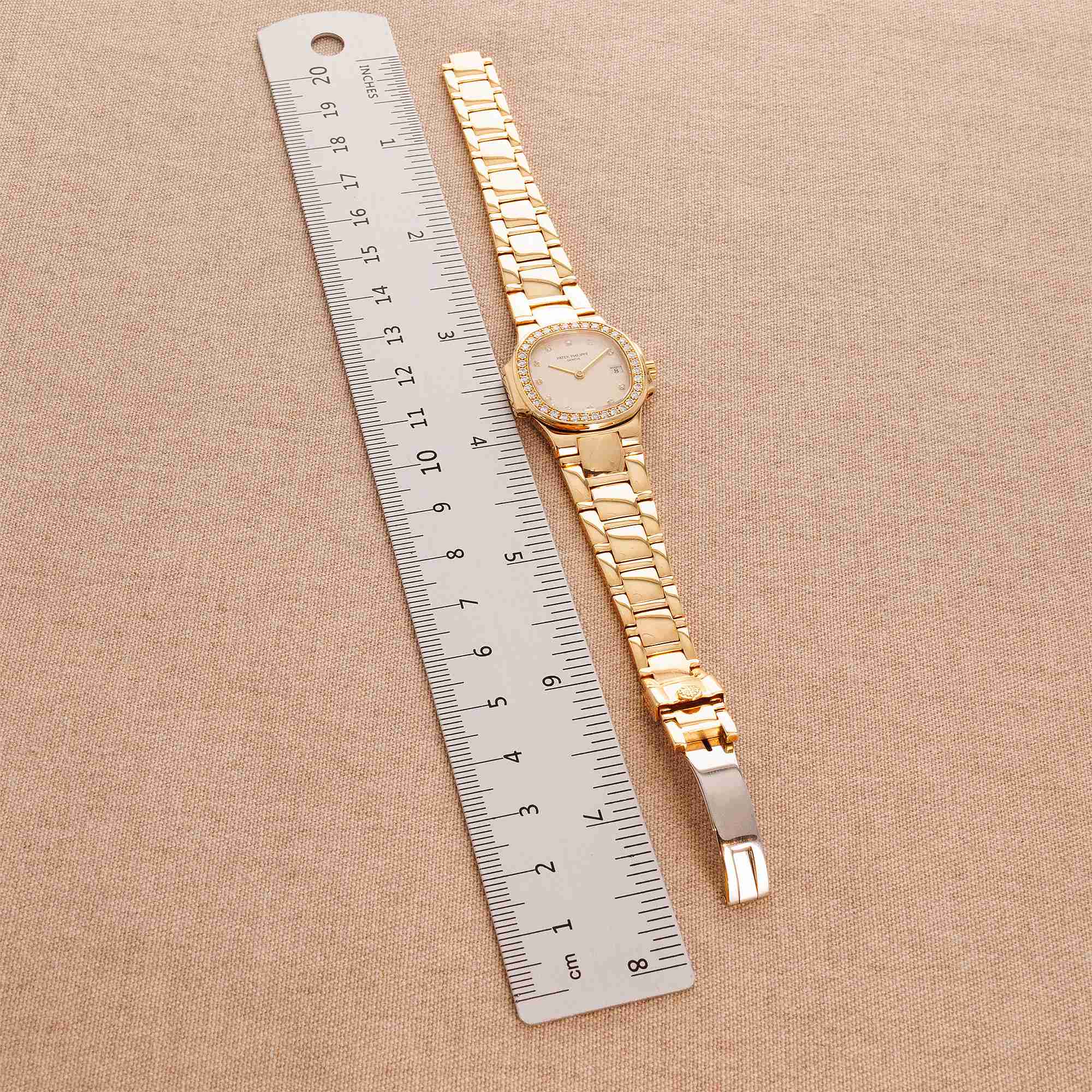 Patek Philippe - Patek Philippe Yellow Gold Nautilus Diamond Watch Ref. 4700 - The Keystone Watches