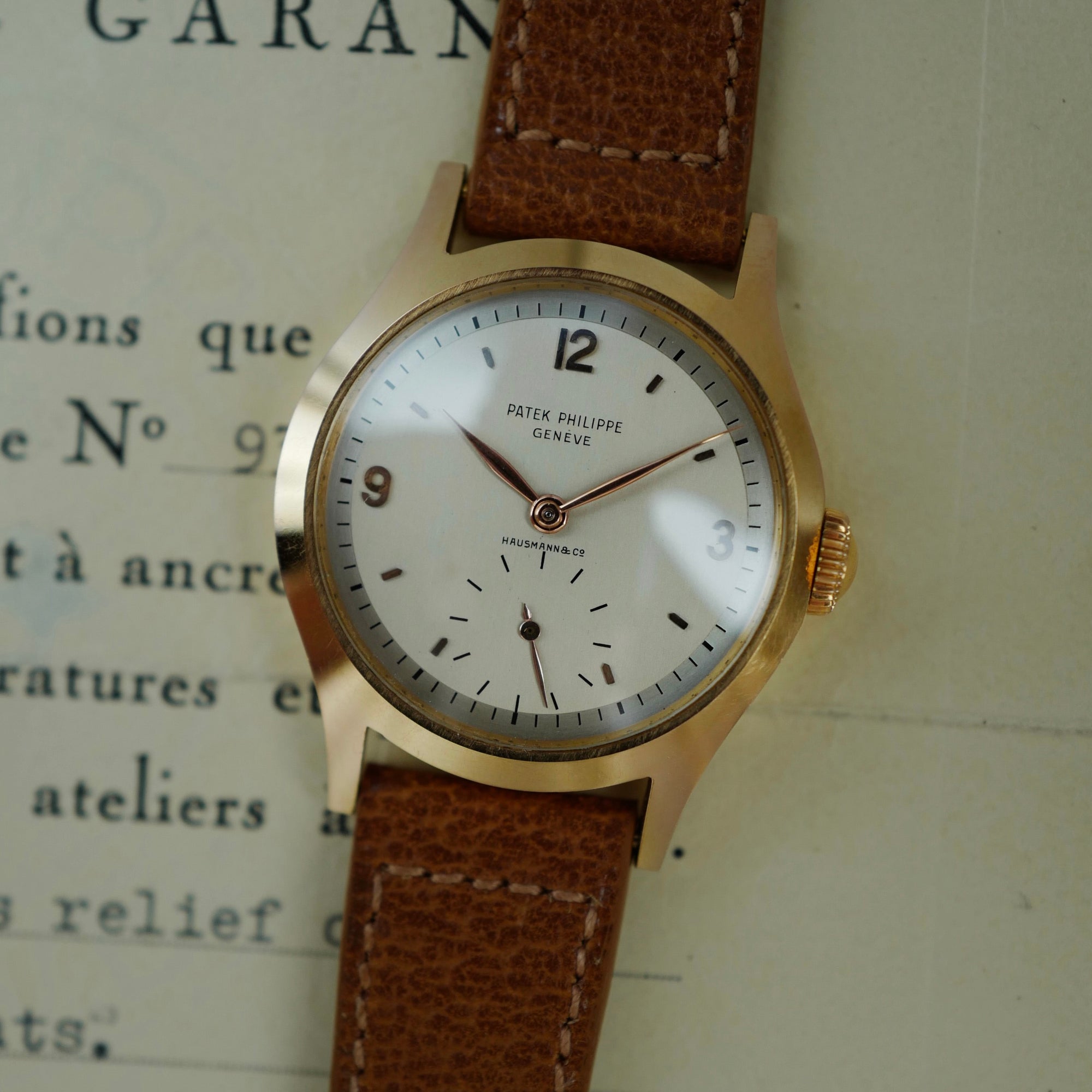 Patek Philippe 565 Retailed by Hausmann & Co. with Original Certificate from 1953