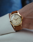 Patek Philippe 565 Retailed by Hausmann & Co. with Original Certificate from 1953