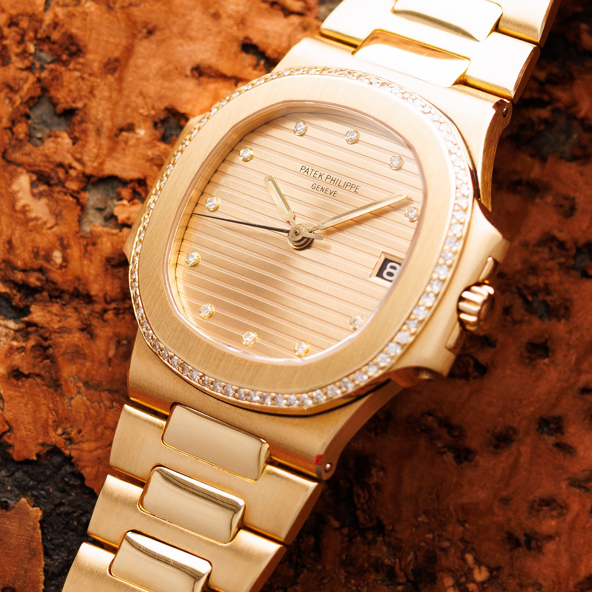 Patek Philippe - Patek Philippe Yellow Gold Nautilus Diamond Watch Ref. 3800 - The Keystone Watches