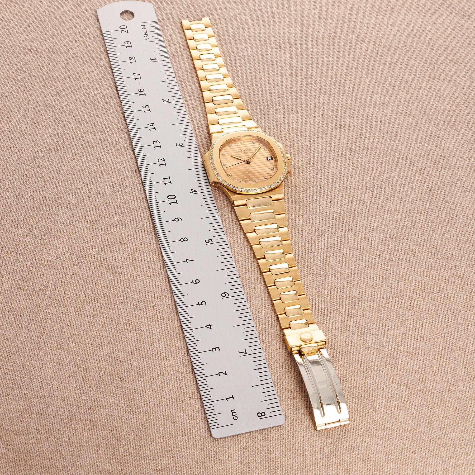 Patek Philippe - Patek Philippe Yellow Gold Nautilus Diamond Watch Ref. 3800 - The Keystone Watches
