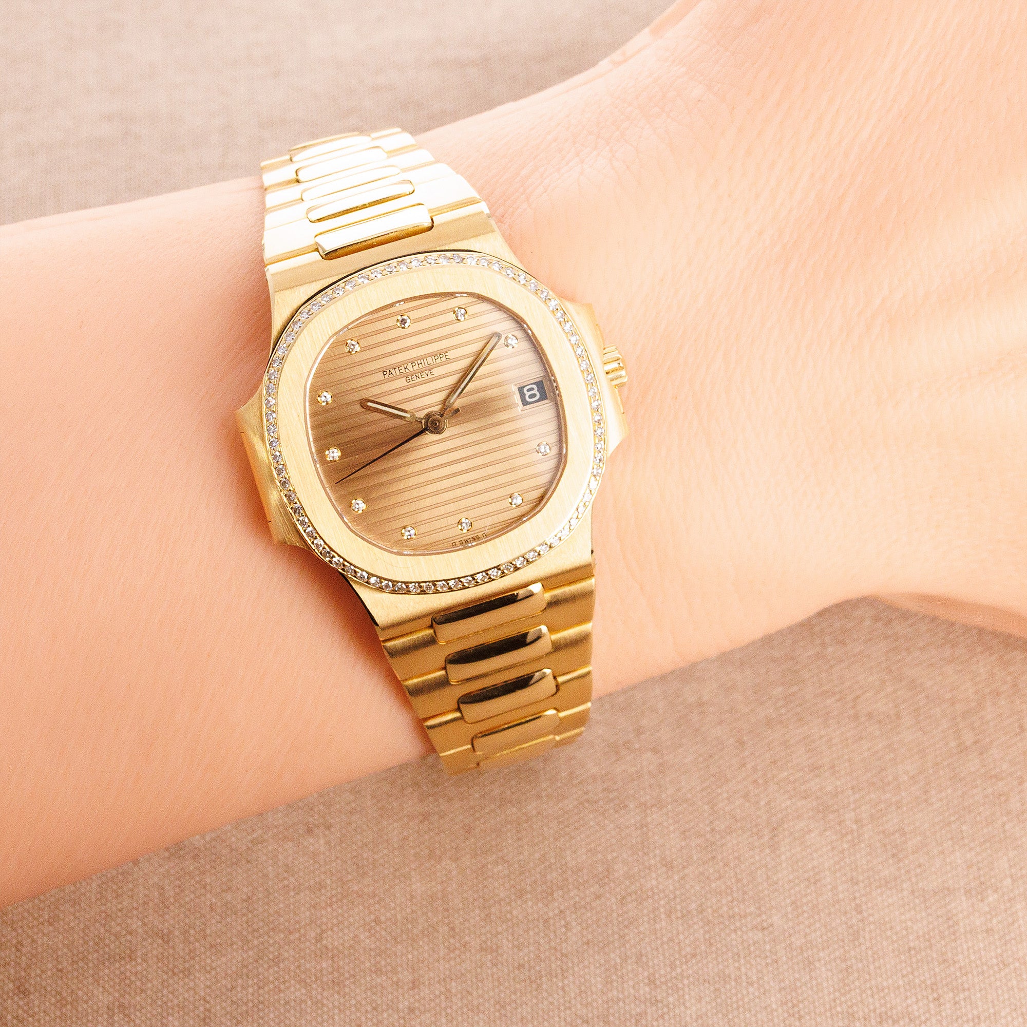 Patek Philippe - Patek Philippe Yellow Gold Nautilus Diamond Watch Ref. 3800 - The Keystone Watches