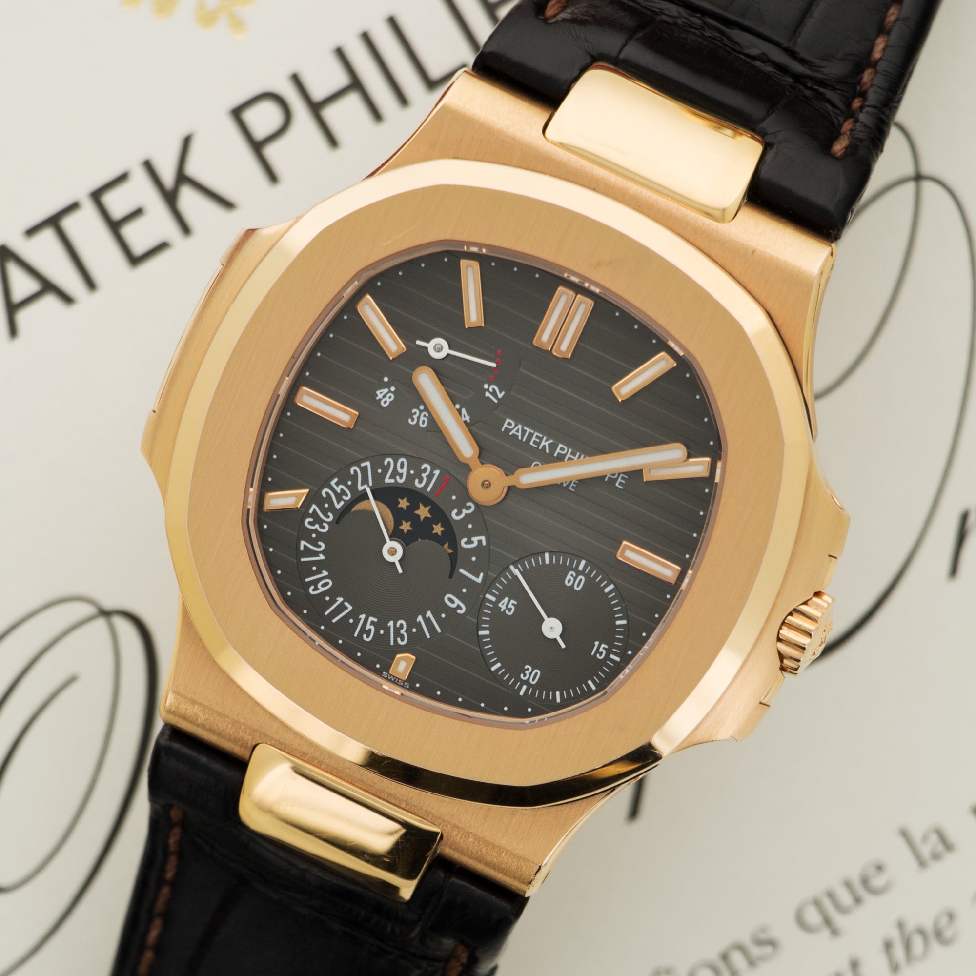 Patek Philippe - Patek Philippe Rose Gold Nautilus Moonphase Watch Ref. 5712 - The Keystone Watches