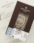 Patek Philippe - Patek Philippe White & Rose Gold Nautilus Moonphase Watch Ref. 5712 - The Keystone Watches
