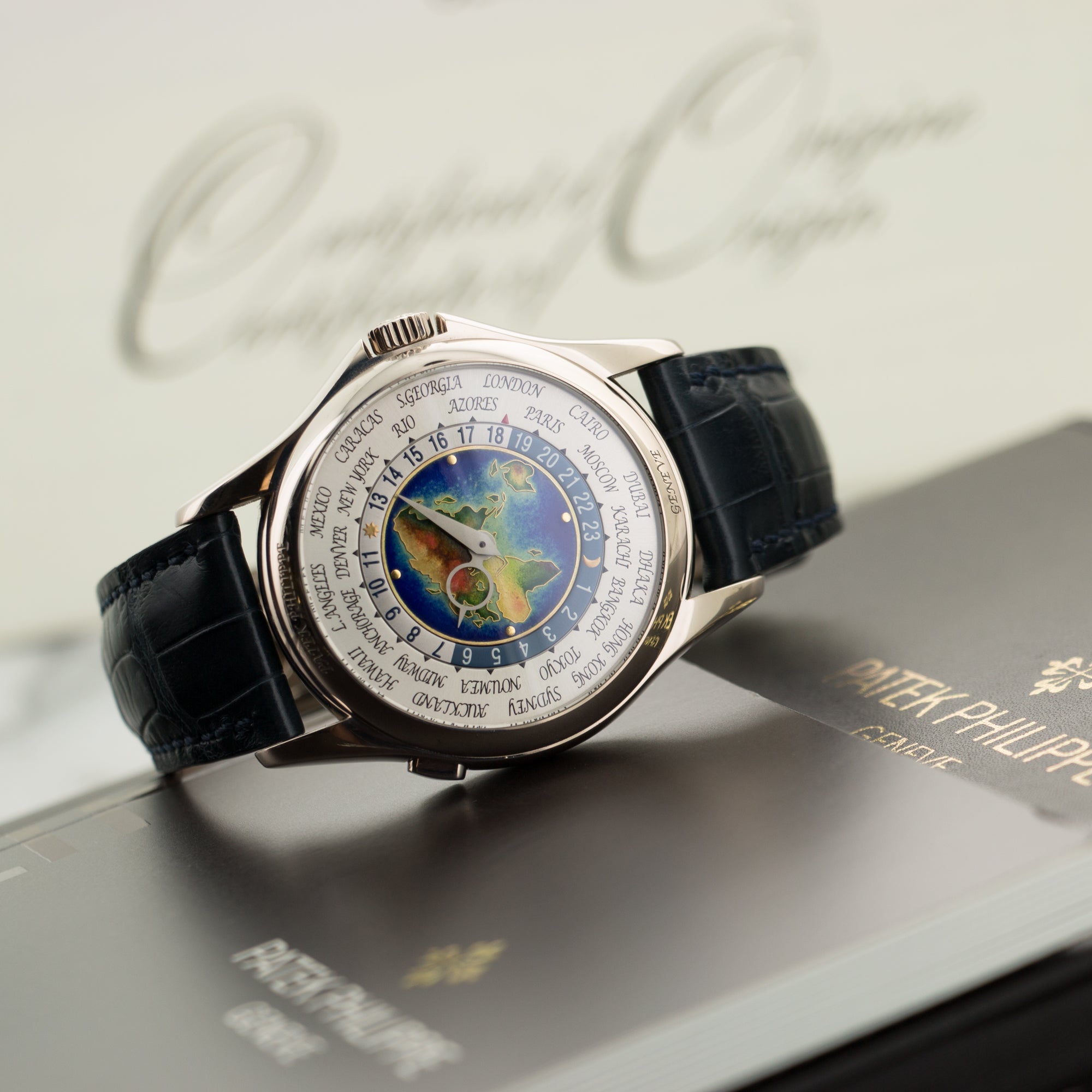 Patek Philippe - Patek Philippe White Gold World Time Cloisonne Watch Ref. 5131G - The Keystone Watches