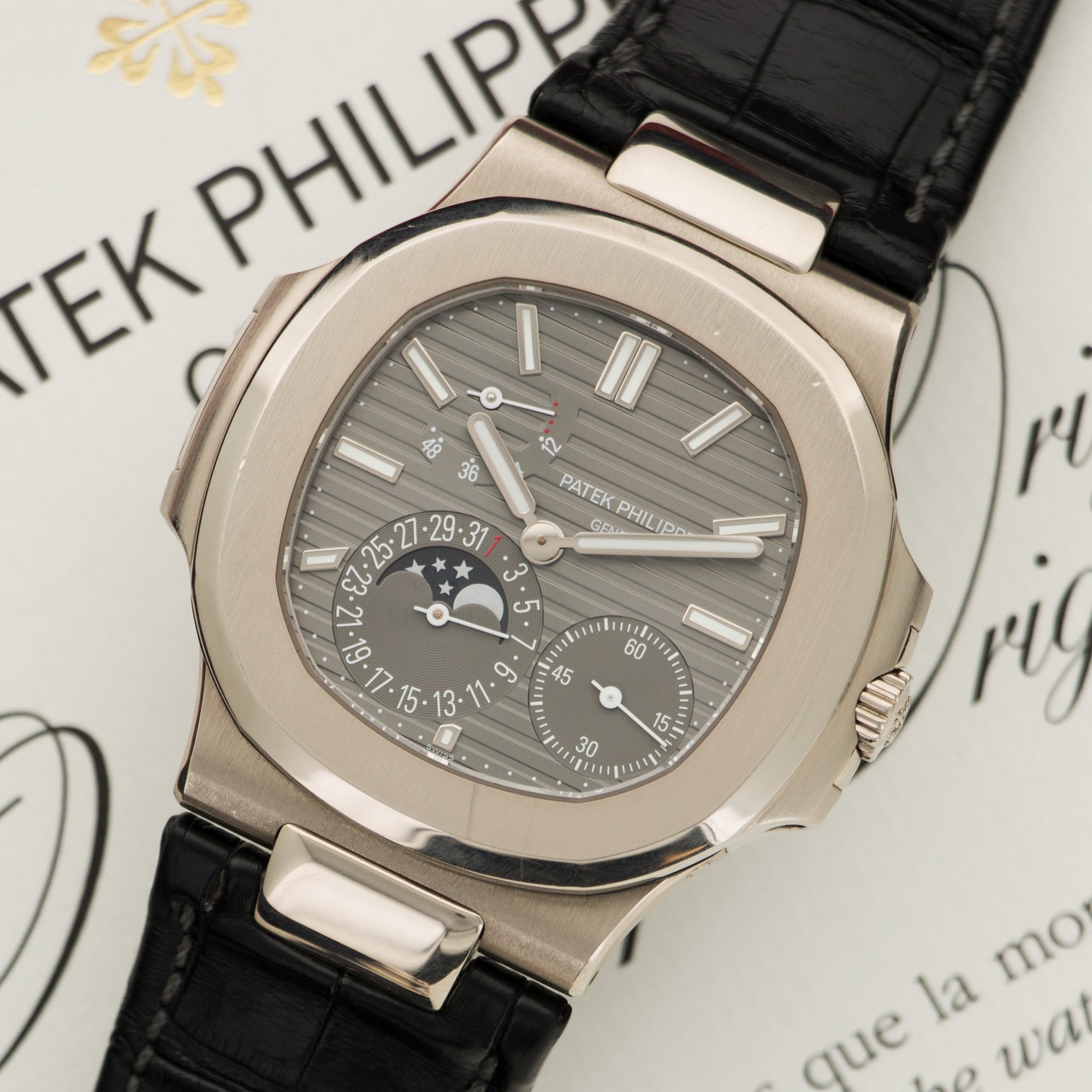 Patek Philippe - Patek Philippe White Gold Nautilus Moonphase Watch Ref. 5712 - The Keystone Watches