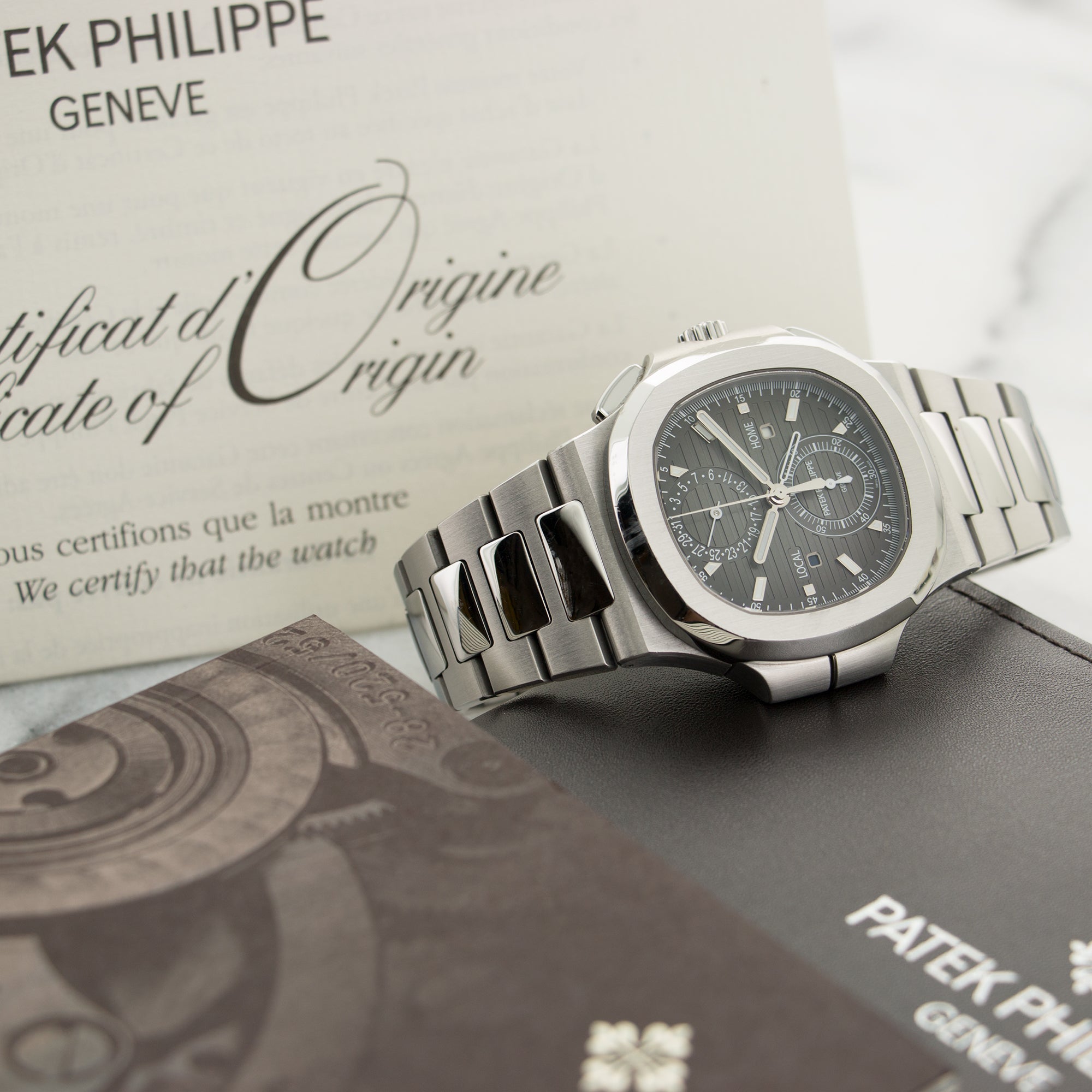 Patek Philippe - Patek Philippe Nautilus Travel Time Chronograph Watch Ref. 5990 - The Keystone Watches