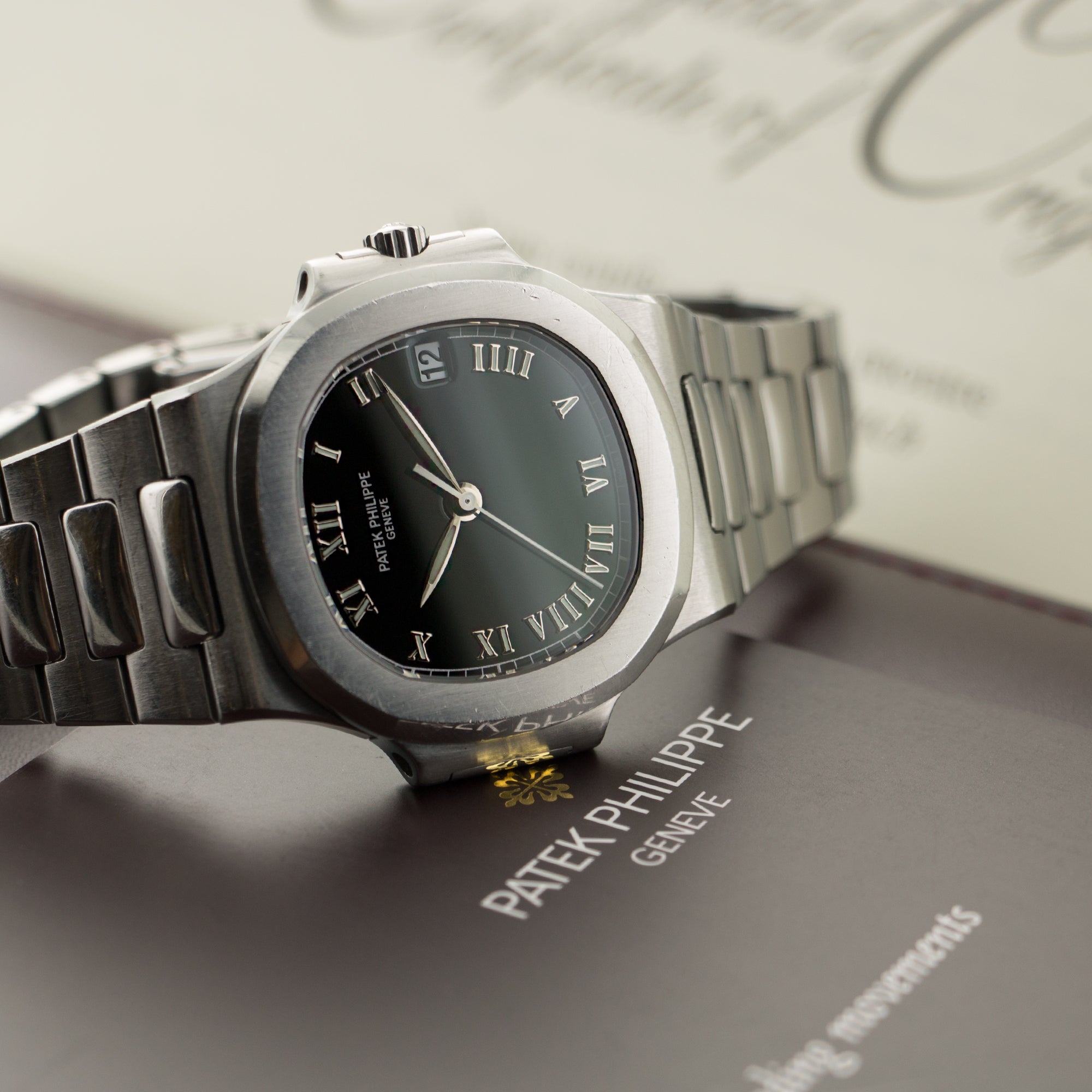 Patek Philippe - Patek Philippe Steel Nautilus Watch Ref. 3800/1A with Original Paper - The Keystone Watches
