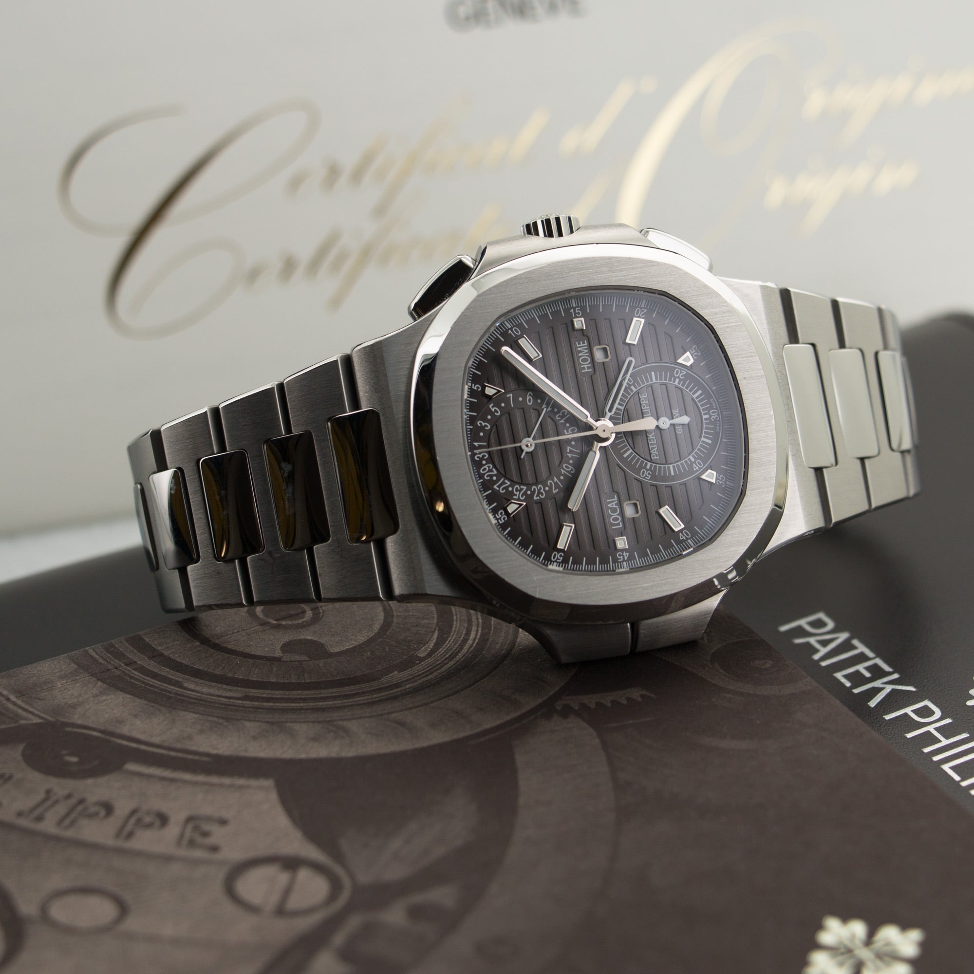 Patek Philippe - Patek Philippe Nautilus Travel Time Chronograph Watch Ref. 5990 - The Keystone Watches