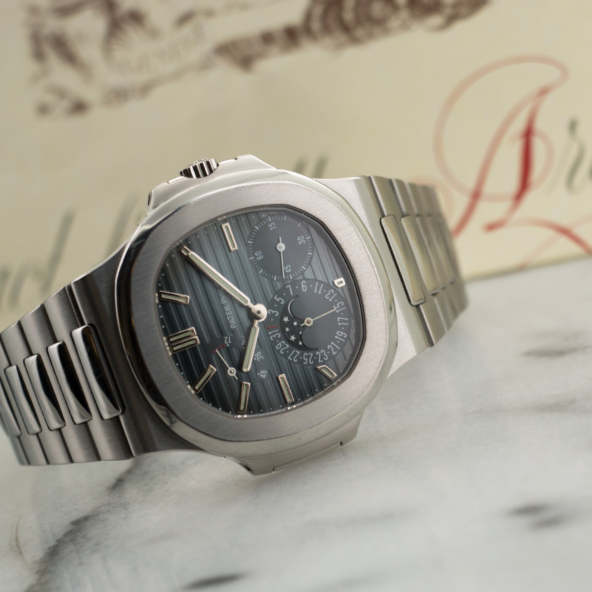 Patek Philippe - Patek Philippe Steel Nautilus Moonphase Watch Ref. 5712/1A - The Keystone Watches