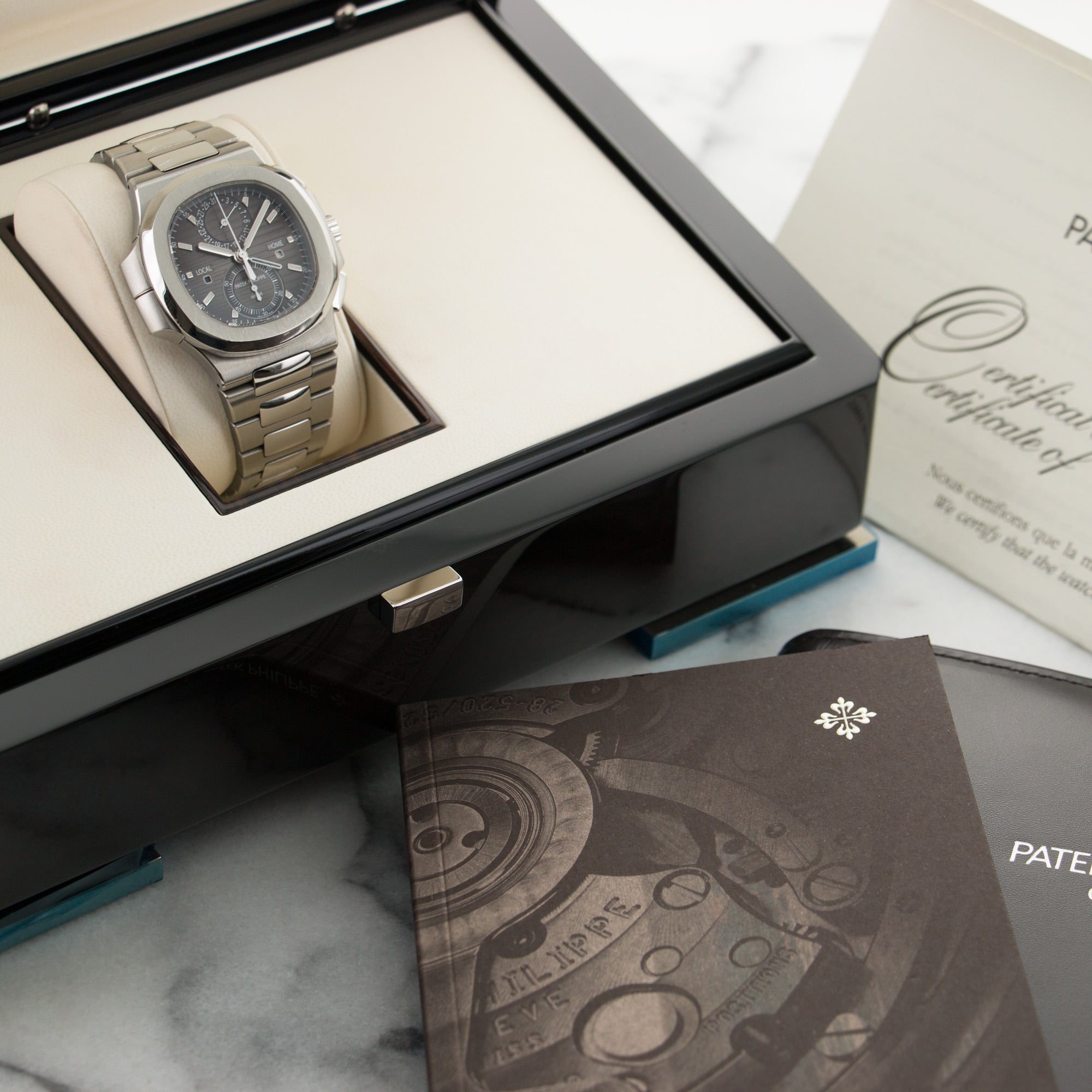 Patek Philippe - Patek Philippe Nautilus Travel Time Chronograph Watch Ref. 5990 - The Keystone Watches