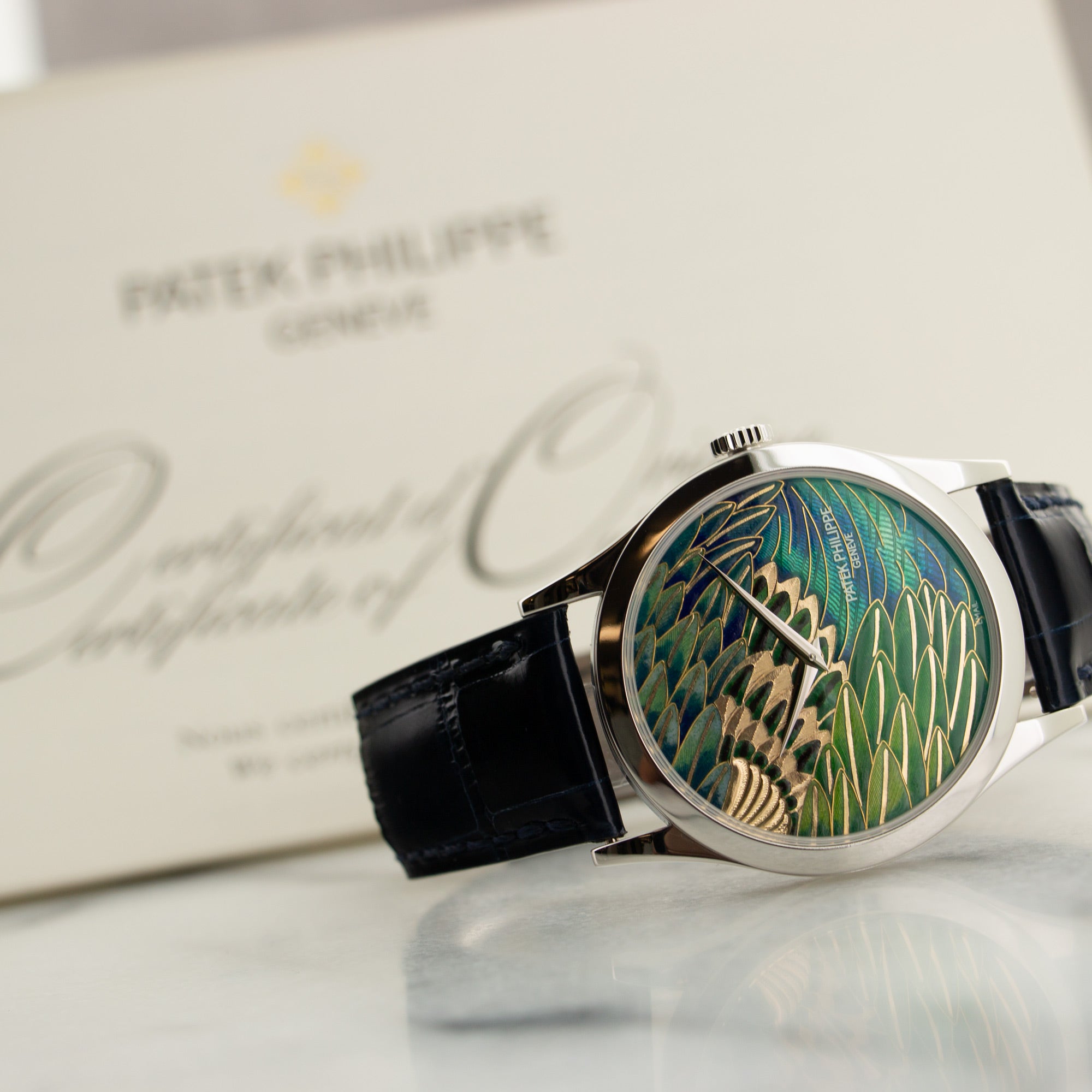 Patek Philippe - Patek Philippe Platinum Cloisonne Dial Watch Ref. 5077 - The Keystone Watches