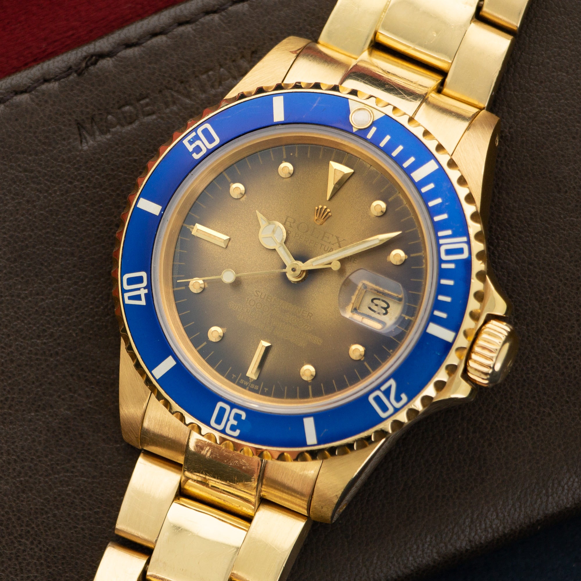 Rolex Submariner Date 18k Yellow Gold Tropical Dial ref 16808