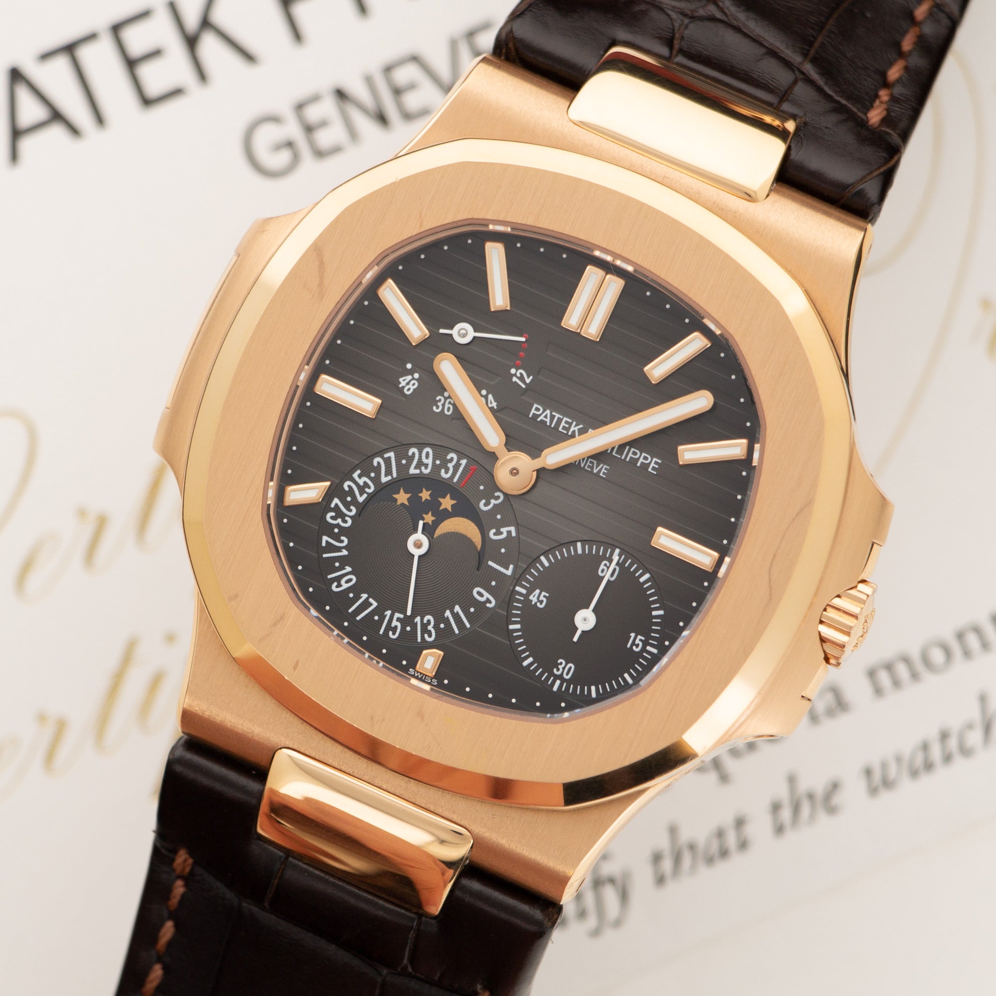Patek Philippe - Patek Philippe Rose Gold Nautilus Moonphase Watch Ref. 5712 - The Keystone Watches