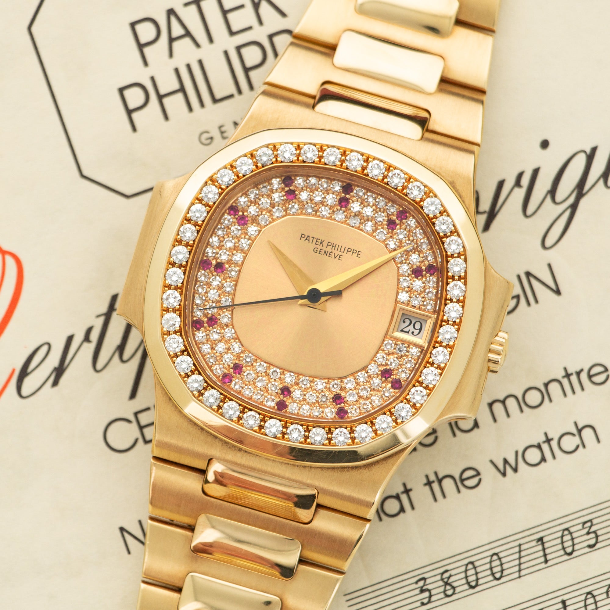 Patek Philippe - Patek Philippe Yellow Gold Nautilus Diamond & Ruby Watch Ref. 3800 - The Keystone Watches