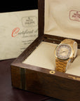 Patek Philippe - Patek Philippe Yellow Gold Nautilus Diamond & Ruby Watch Ref. 3800 - The Keystone Watches