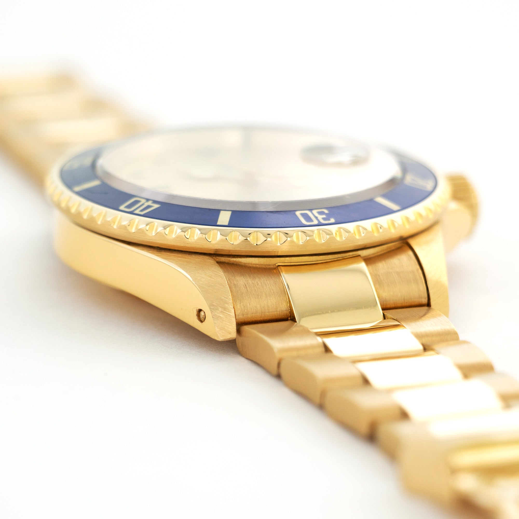 Rolex - Rolex Yellow Gold Submariner Diamond & Sapphire Watch Ref. 16808 - The Keystone Watches