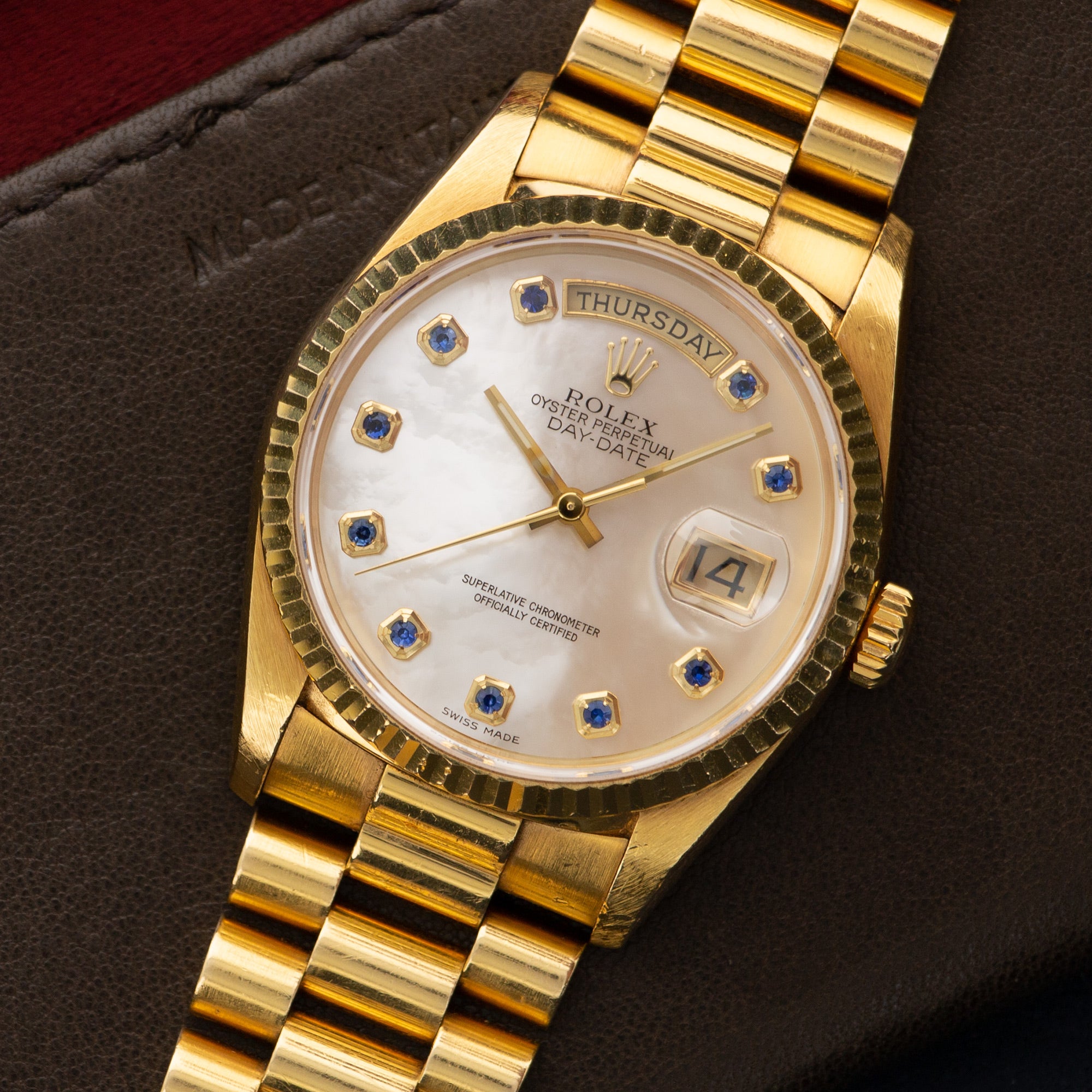 Rolex - Rolex Yellow Gold Day-Date Mother of Pearl Sapphire Watch Ref. 18238 - The Keystone Watches
