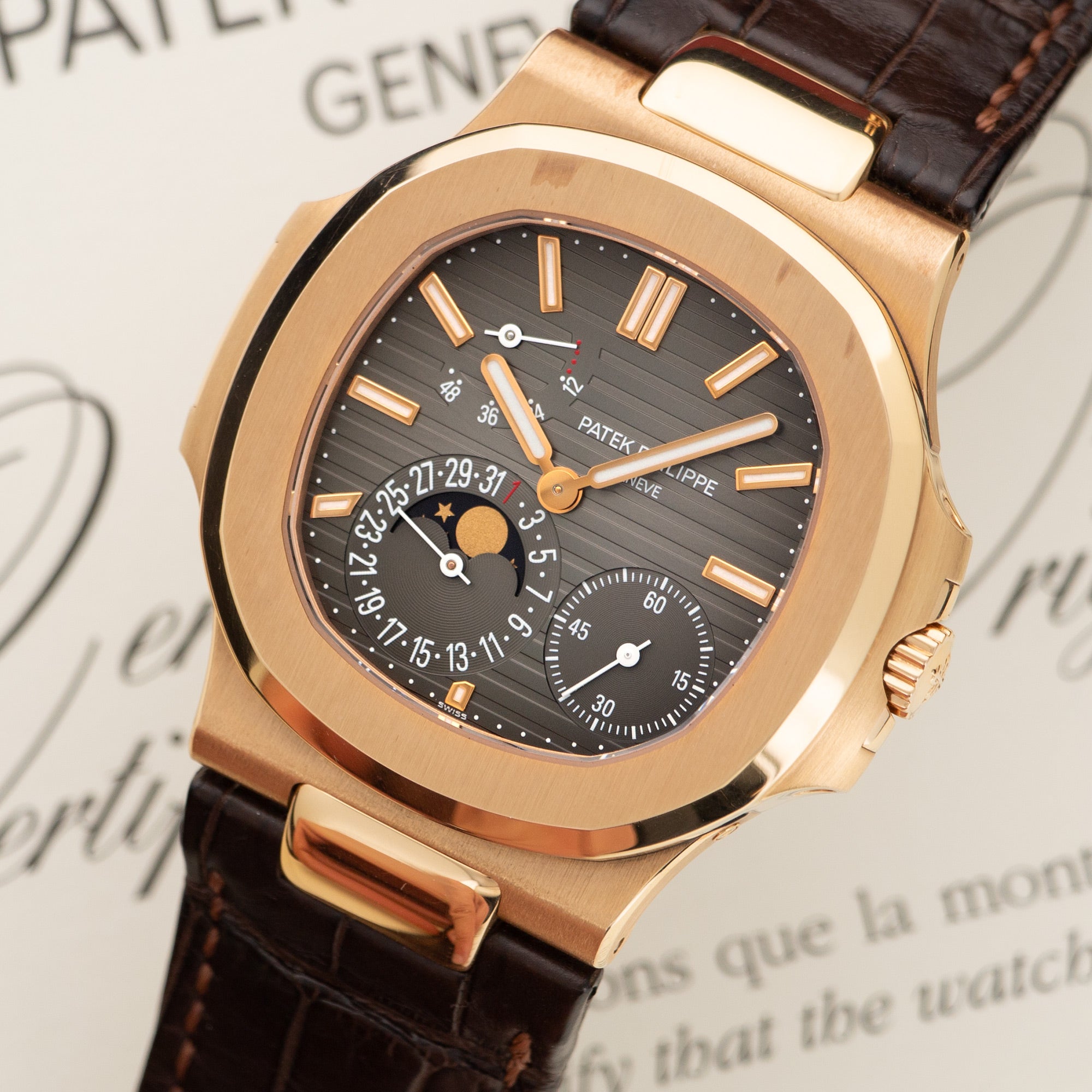 Patek Philippe - Patek Philippe Rose Gold Nautilus Moonphase Watch Ref. 5712 - The Keystone Watches