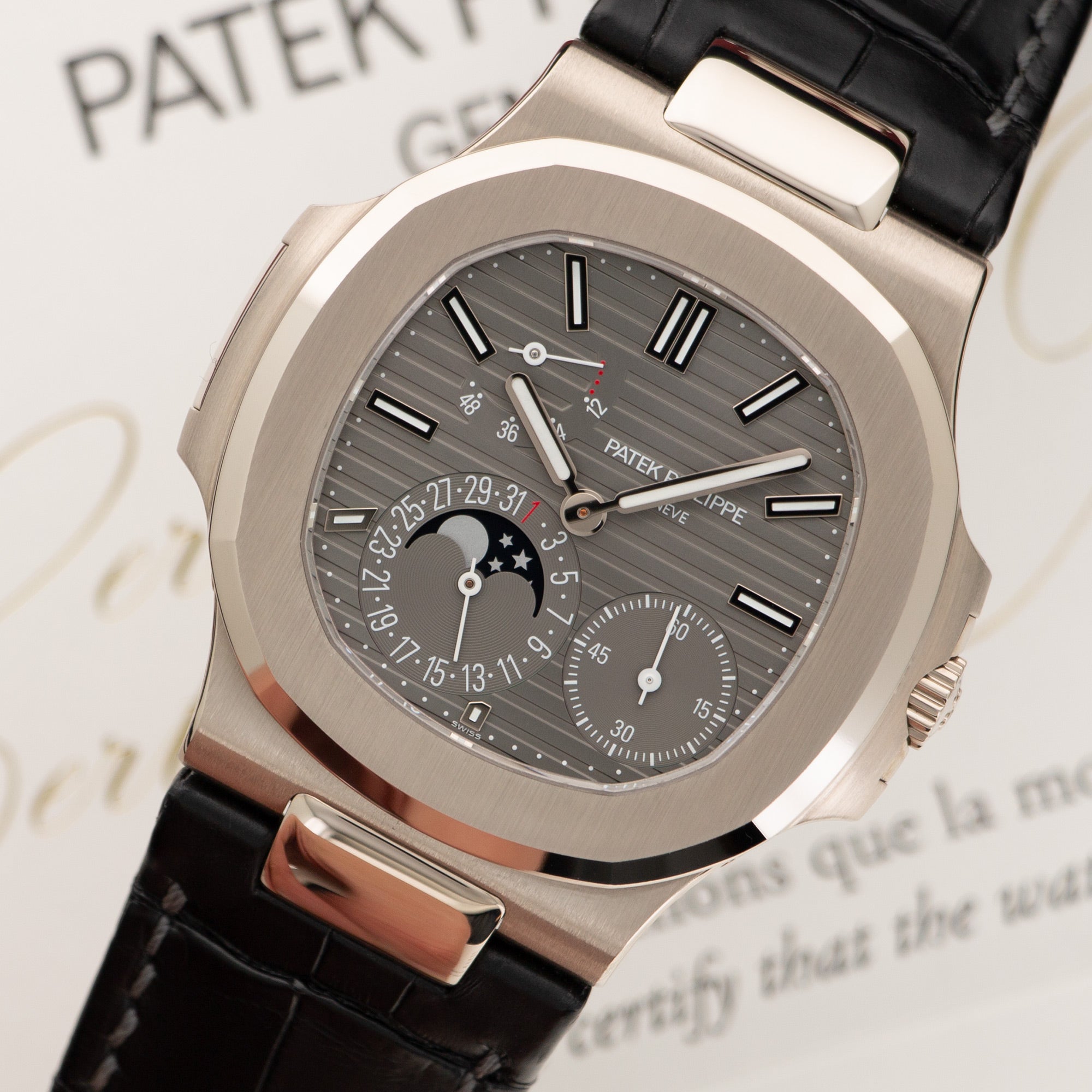 Patek Philippe - Patek Philippe White Gold Nautilus Moonphase Watch Ref. 5712 - The Keystone Watches