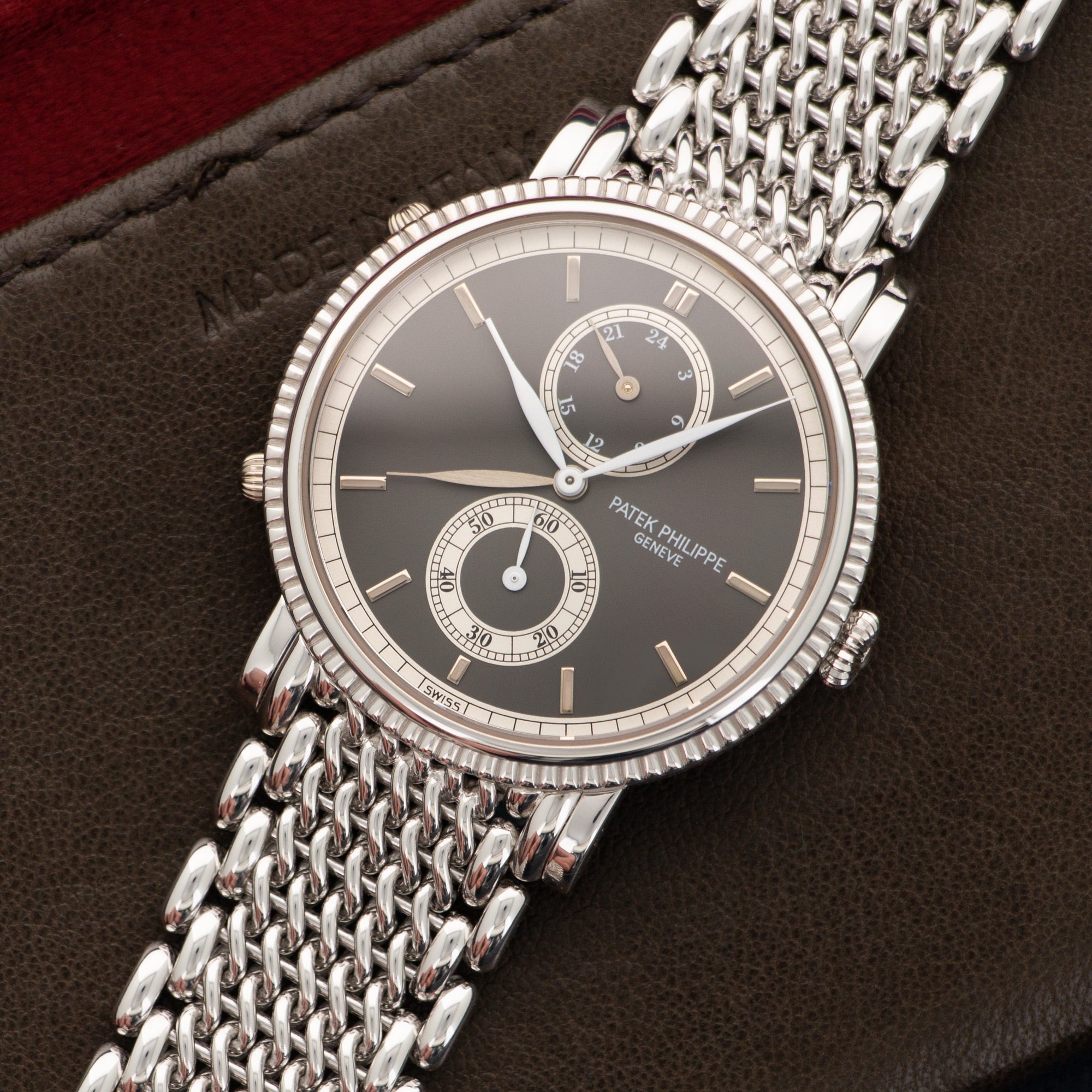 Patek Philippe - Patek Philippe Travel Time White Gold On Bracelet Ref. 5034 - The Keystone Watches