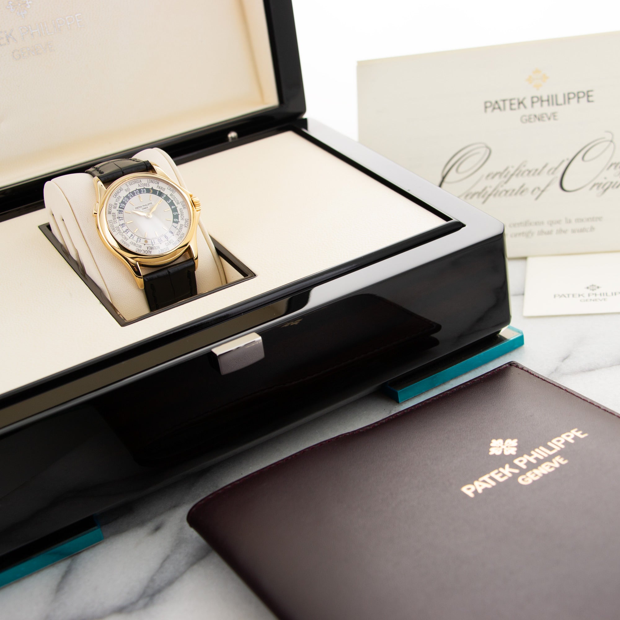 Patek Philippe - Patek Philippe Yellow Gold World Time Watch Ref. 5110, with Original Box and Papers - The Keystone Watches
