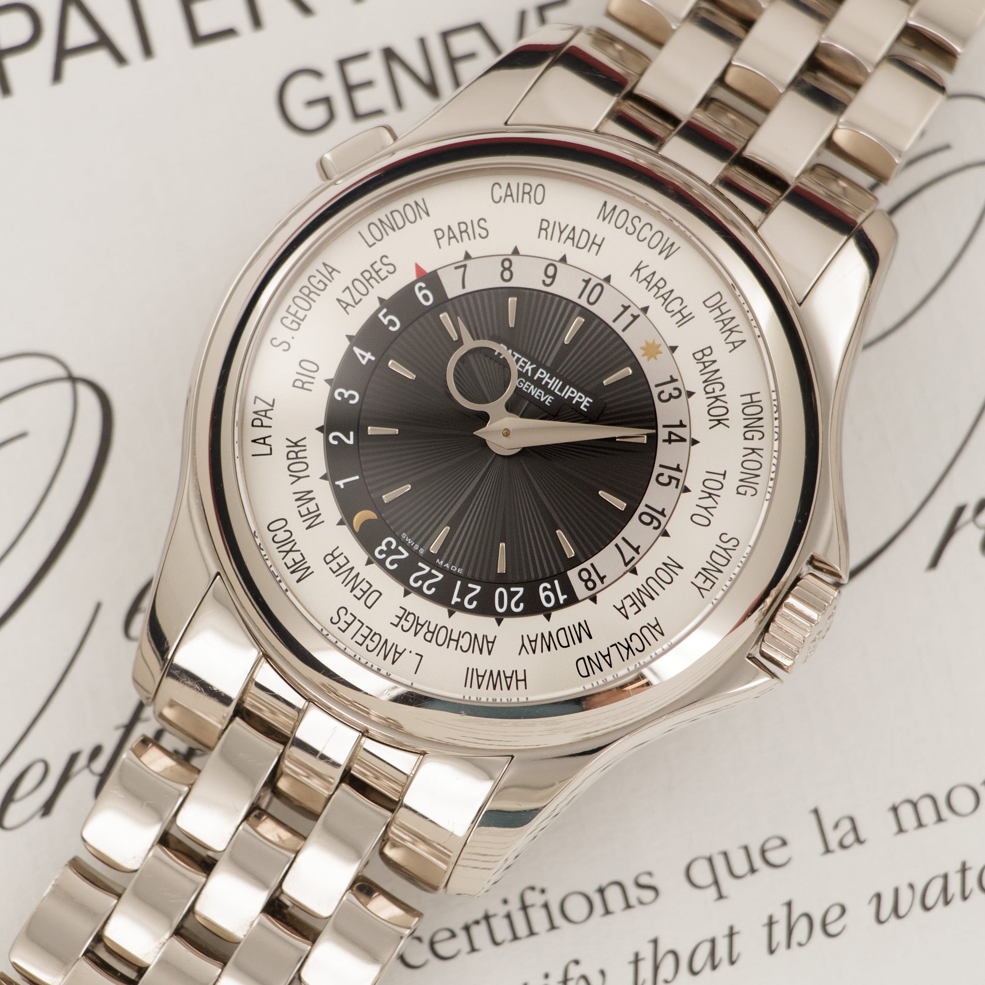 Patek Philippe - Patek Philippe White Gold World Time Bracelet Watch Ref. 5130 - The Keystone Watches