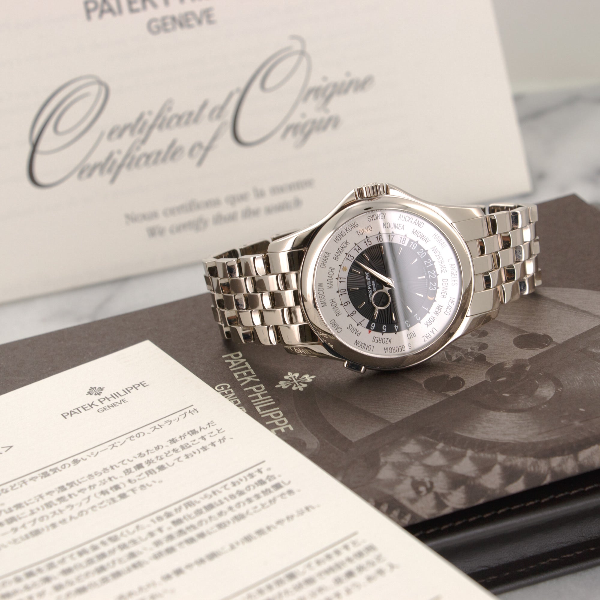 Patek Philippe - Patek Philippe White Gold World Time Bracelet Watch Ref. 5130 - The Keystone Watches
