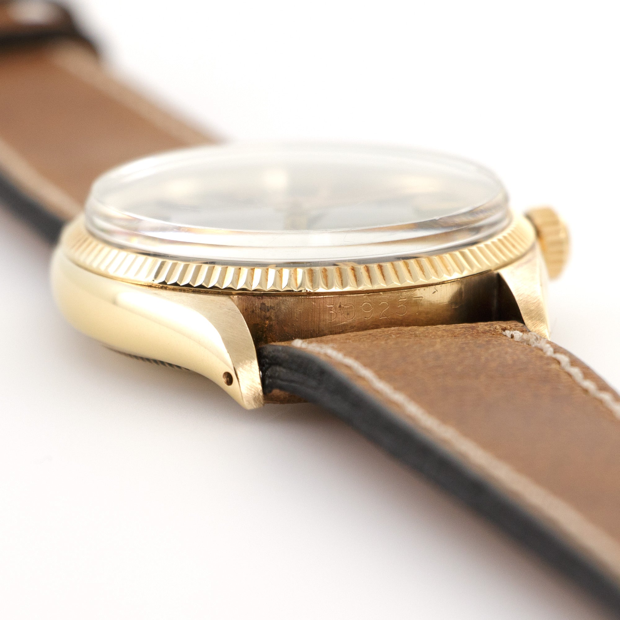 Rolex - Rolex Yellow Gold Oyster Perpetual Black Gilt Dial Watch Ref. 6567 - The Keystone Watches