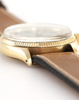 Rolex - Rolex Yellow Gold Oyster Perpetual Black Gilt Dial Watch Ref. 6567 - The Keystone Watches