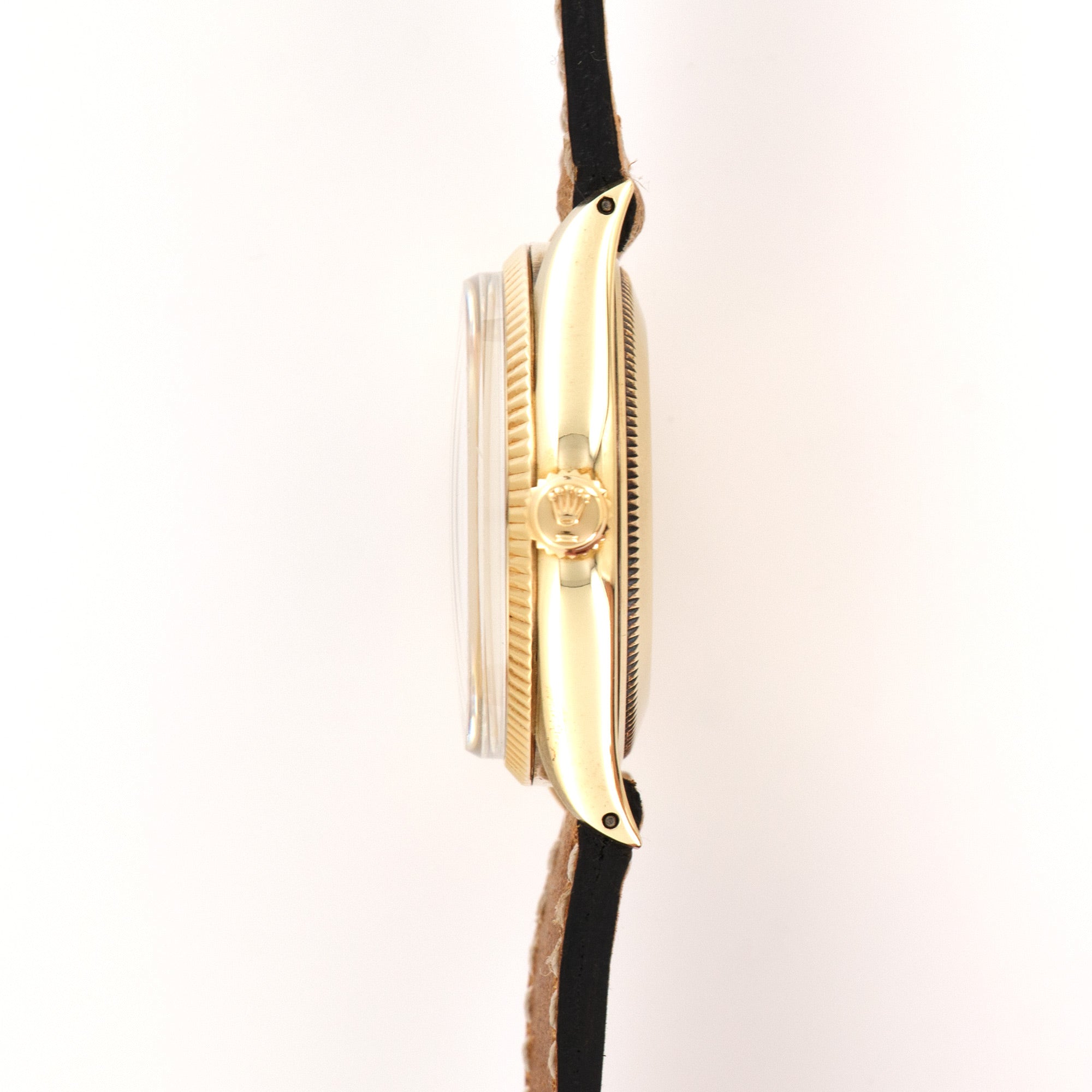 Rolex - Rolex Yellow Gold Oyster Perpetual Black Gilt Dial Watch Ref. 6567 - The Keystone Watches