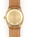 Rolex - Rolex Yellow Gold Oyster Perpetual Black Gilt Dial Watch Ref. 6567 - The Keystone Watches