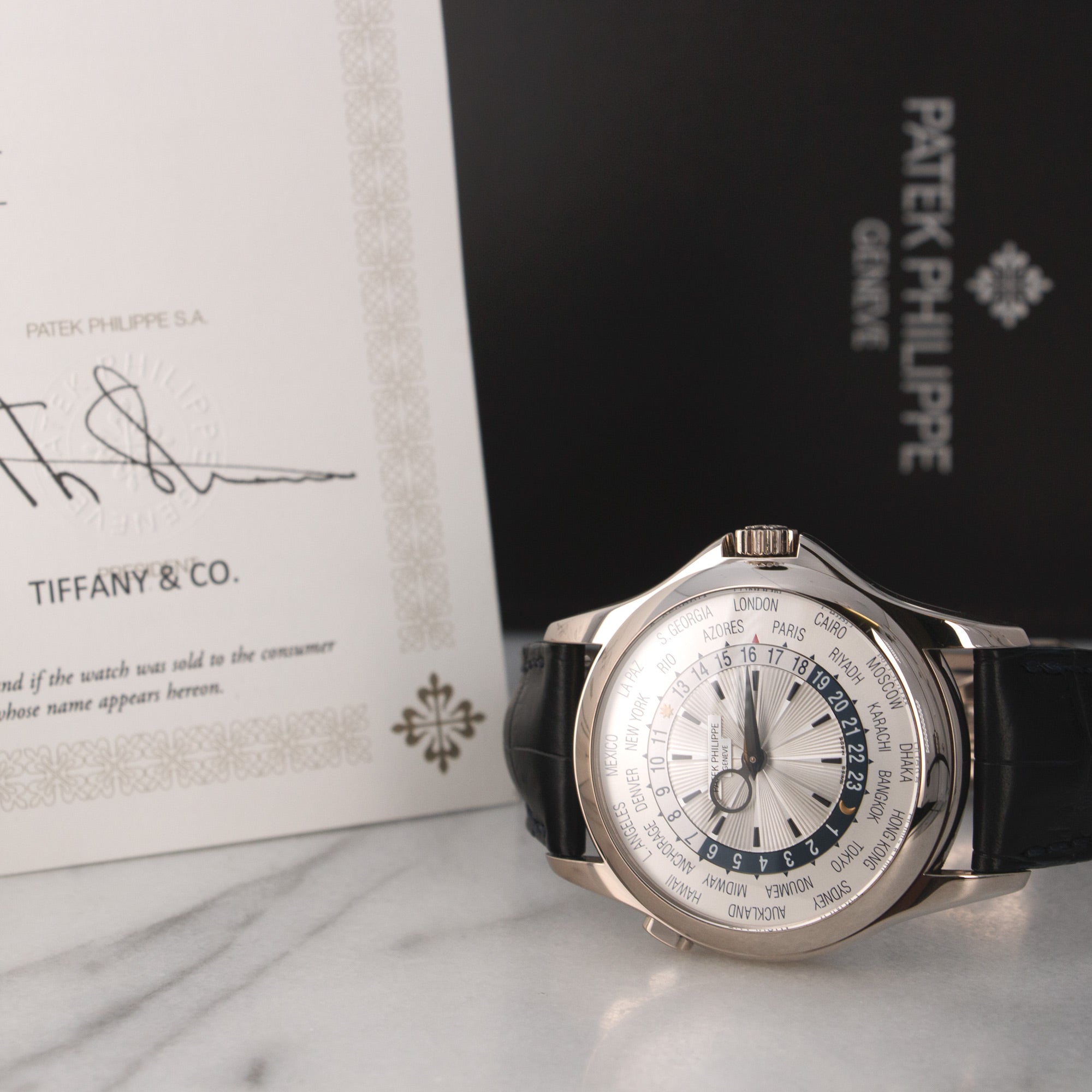 Patek Philippe - Patek Philippe White Gold World Time Watch Ref. 5130, Retailed by Tiffany & Co. - The Keystone Watches